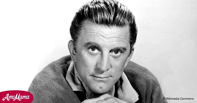 Kirk Douglas, 101, gazes gently at his 8-month-old great-granddaughter in family pic