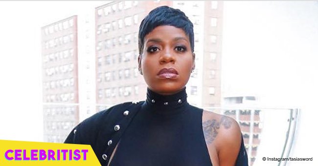 Fantasia flaunts curves in tight, black bodysuit during performance