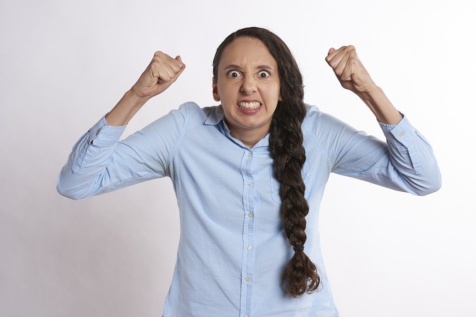 A portrait of an angry woman. | Photo: Pixabay 