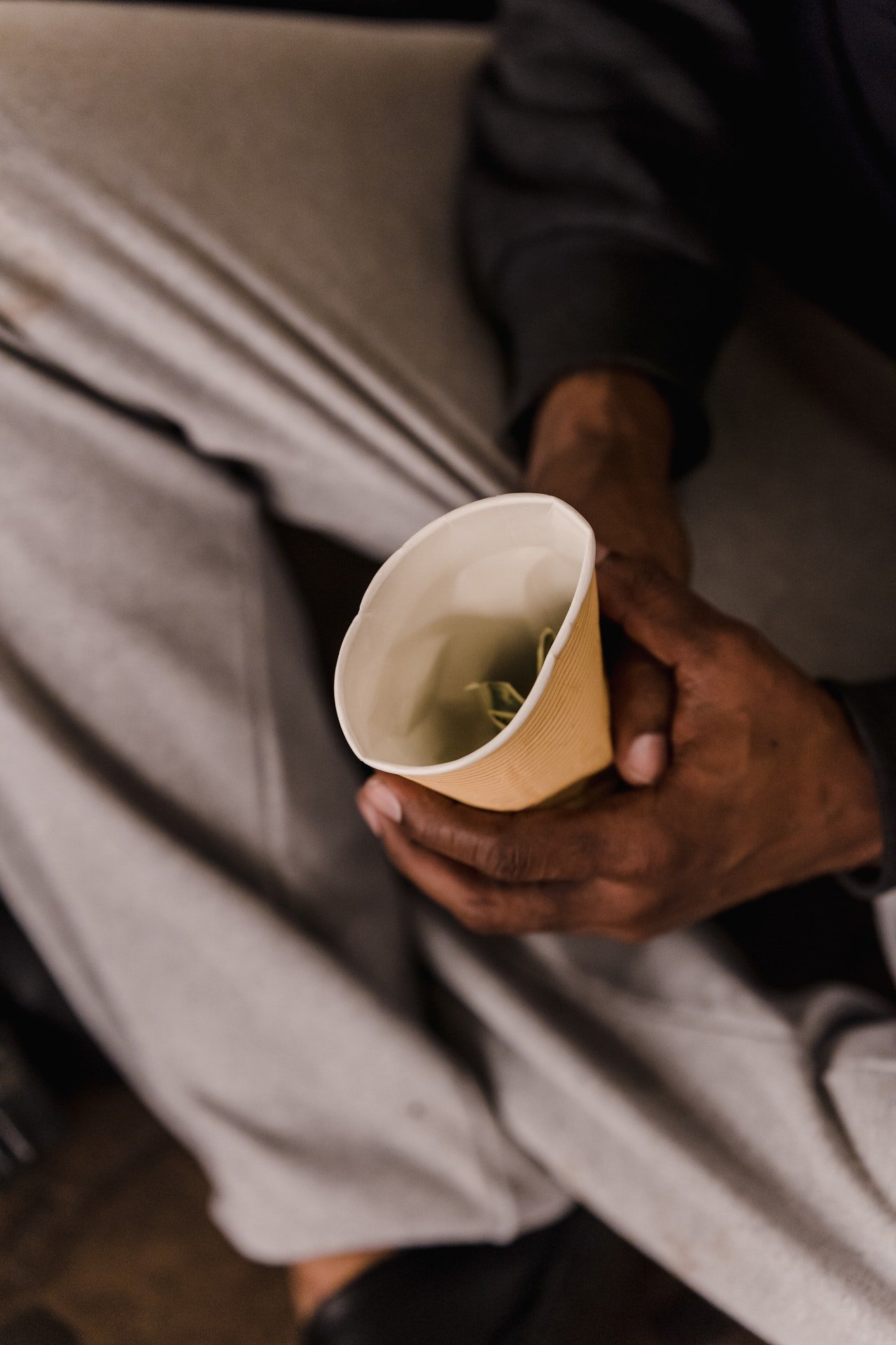 He decided to help out the street beggar but asked him something. | Source: Pexels