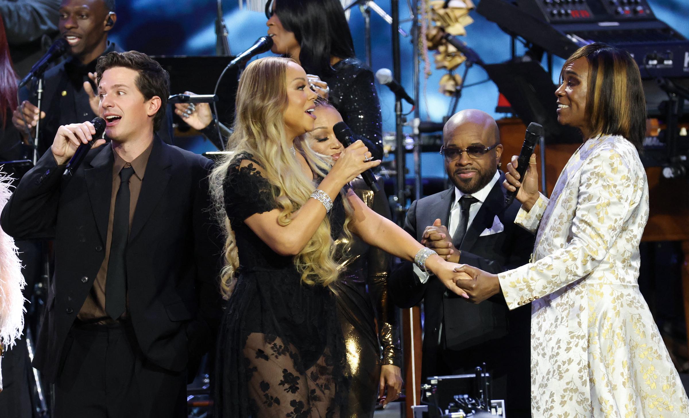 Charlie Puth, Jermaine Dupri, Mariah Carey, and Billy Porter perform onstage during the 2026 MusiCares Person of the Year gala in Los Angeles on January 30. | Source: Getty Images