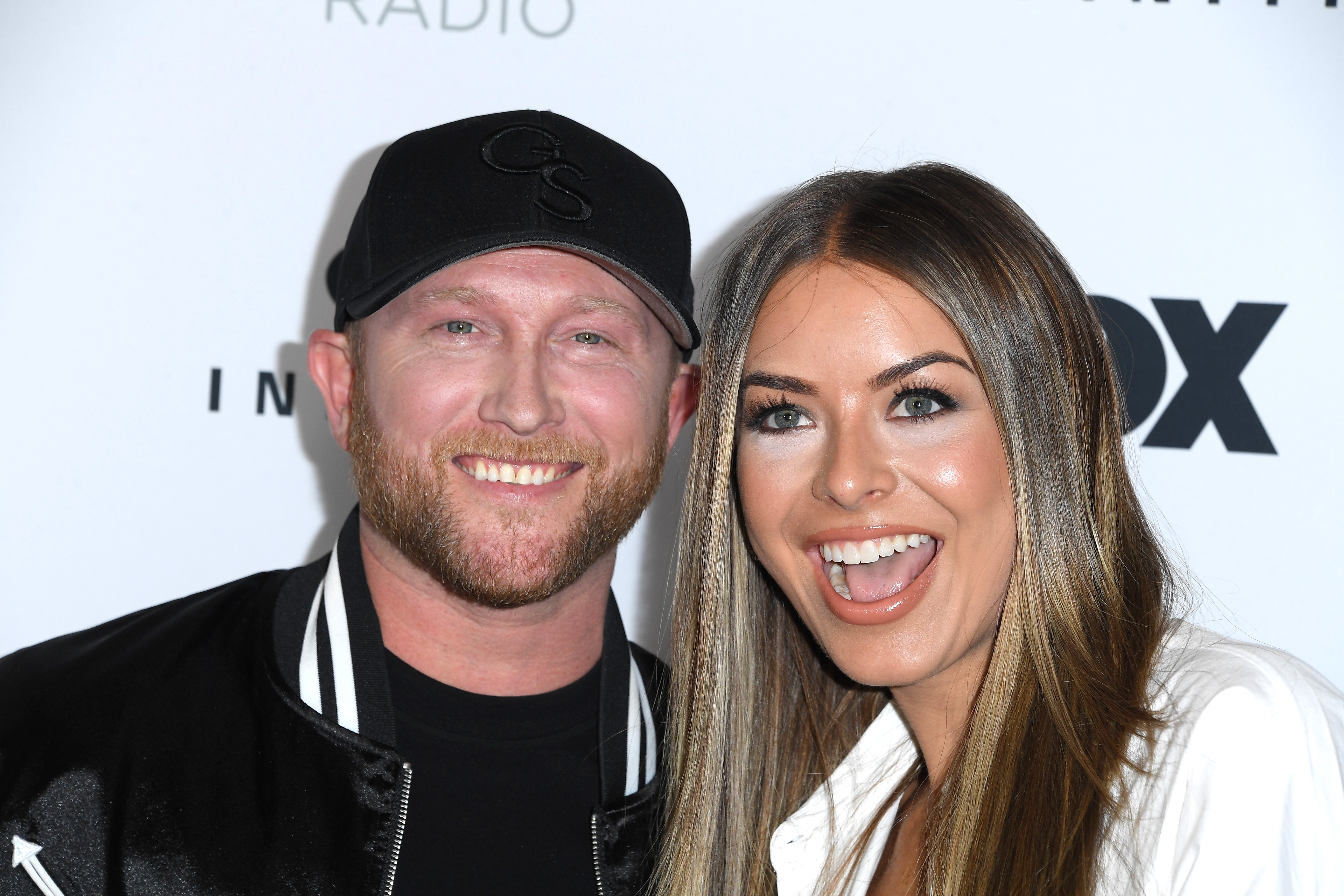 Cole Swindell and Courtney Little at the 2023 iHeartRadio Music Awards - Press Room at Dolby Theatre, on March 27, 2023, in Hollywood, California | Source: Getty Images