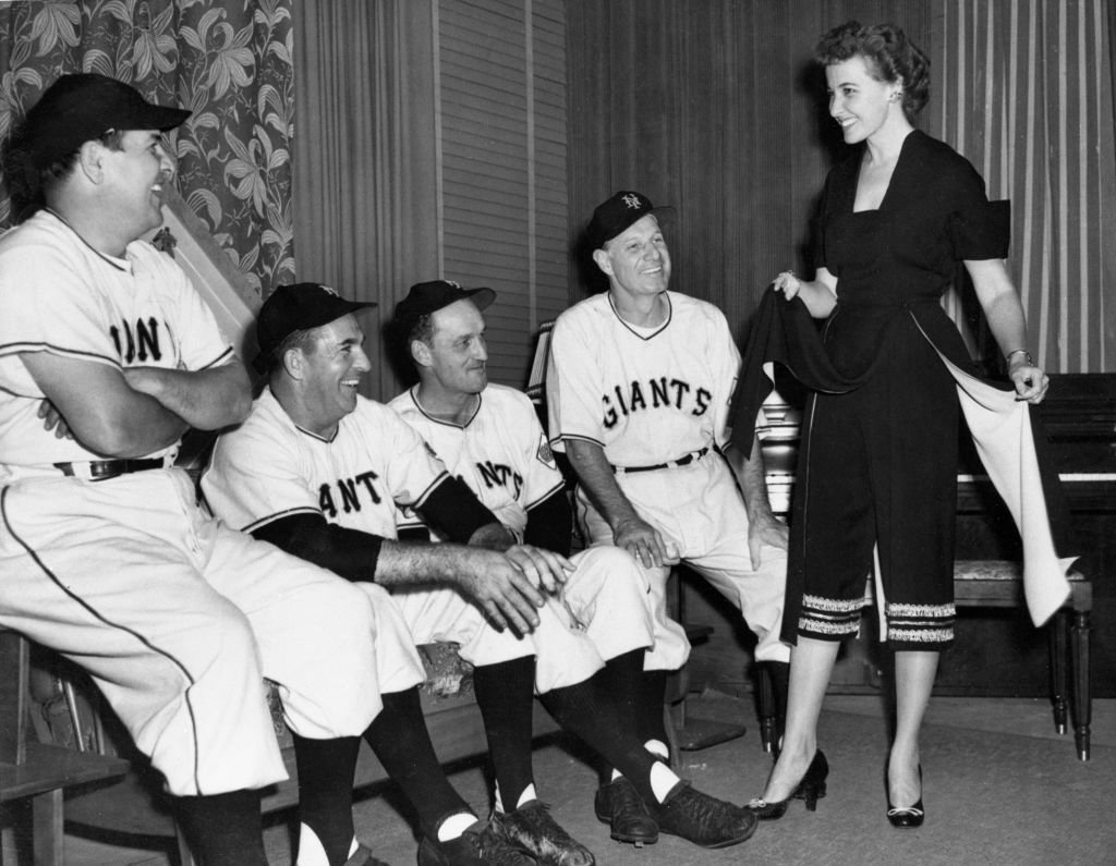 Laraine Day, Leo Durocher, and the New York Giant coaches circa 1951 | Source: Getty Images