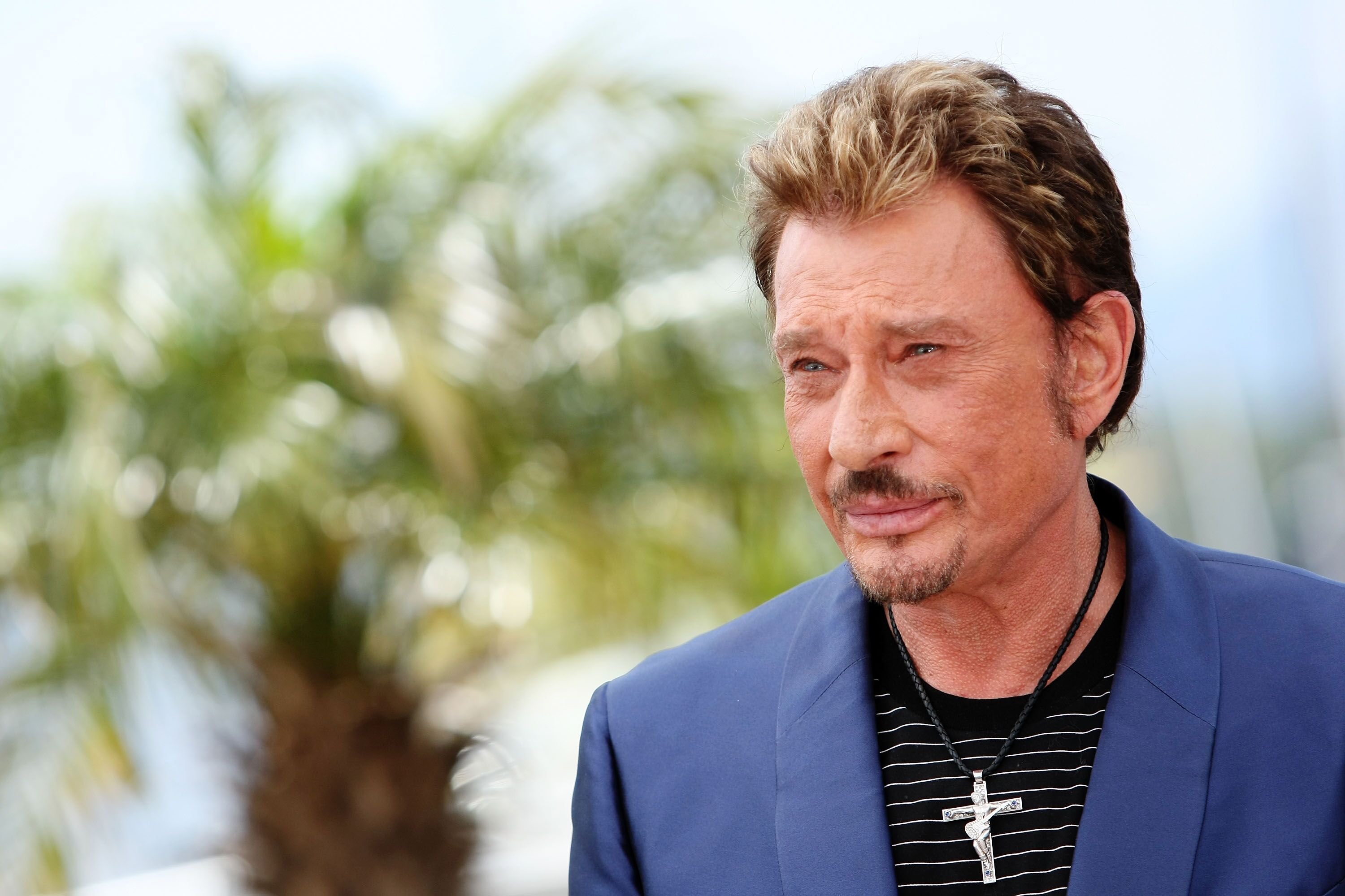 L'acteur et musicien Johnny Hallyday assiste au Vengeance Photocall au Palais des Festivals pendant le 62ème Festival International du Film de Cannes le 17 mai 2009 à Cannes, France. | Photo : Getty Images
