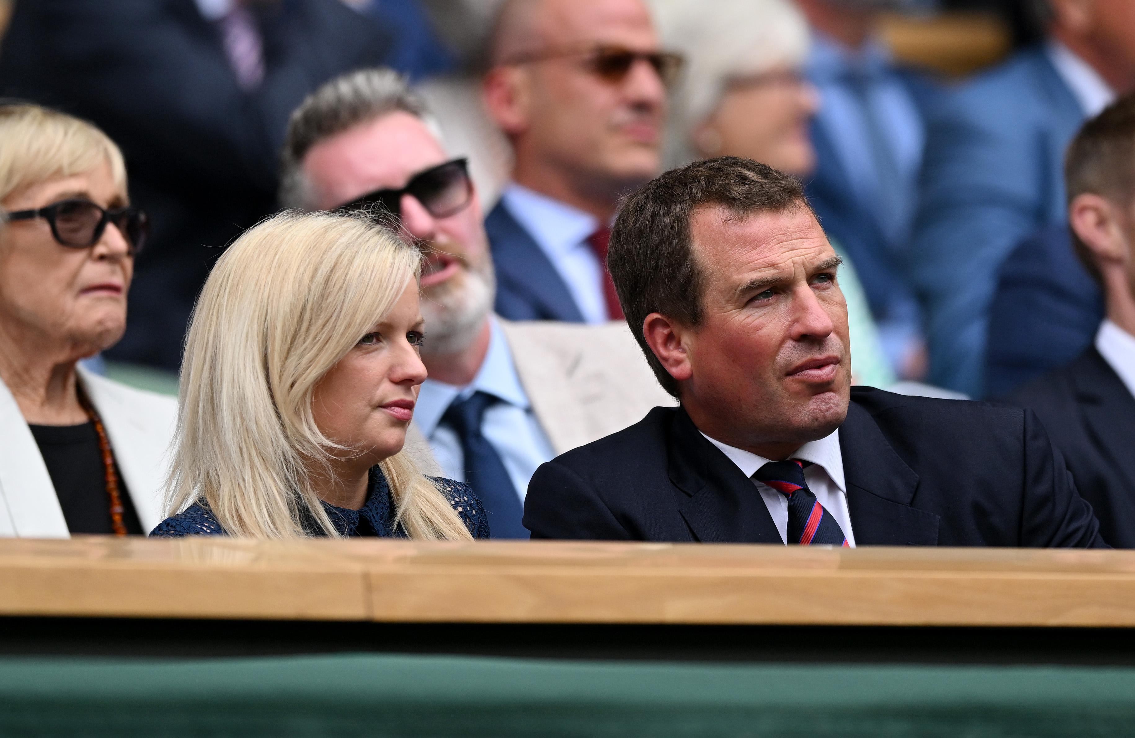 Peter Phillips and Lindsay Wallace are seen in the Royal Box before Simona Halep of Romania plays against Amanda Anisimova of The United States during their Women's Singles Quarter Final match on Day 10 of The Championships Wimbledon 2022 at All England Lawn Tennis and Croquet Club on 6 July in London, England. | Source: Getty Images