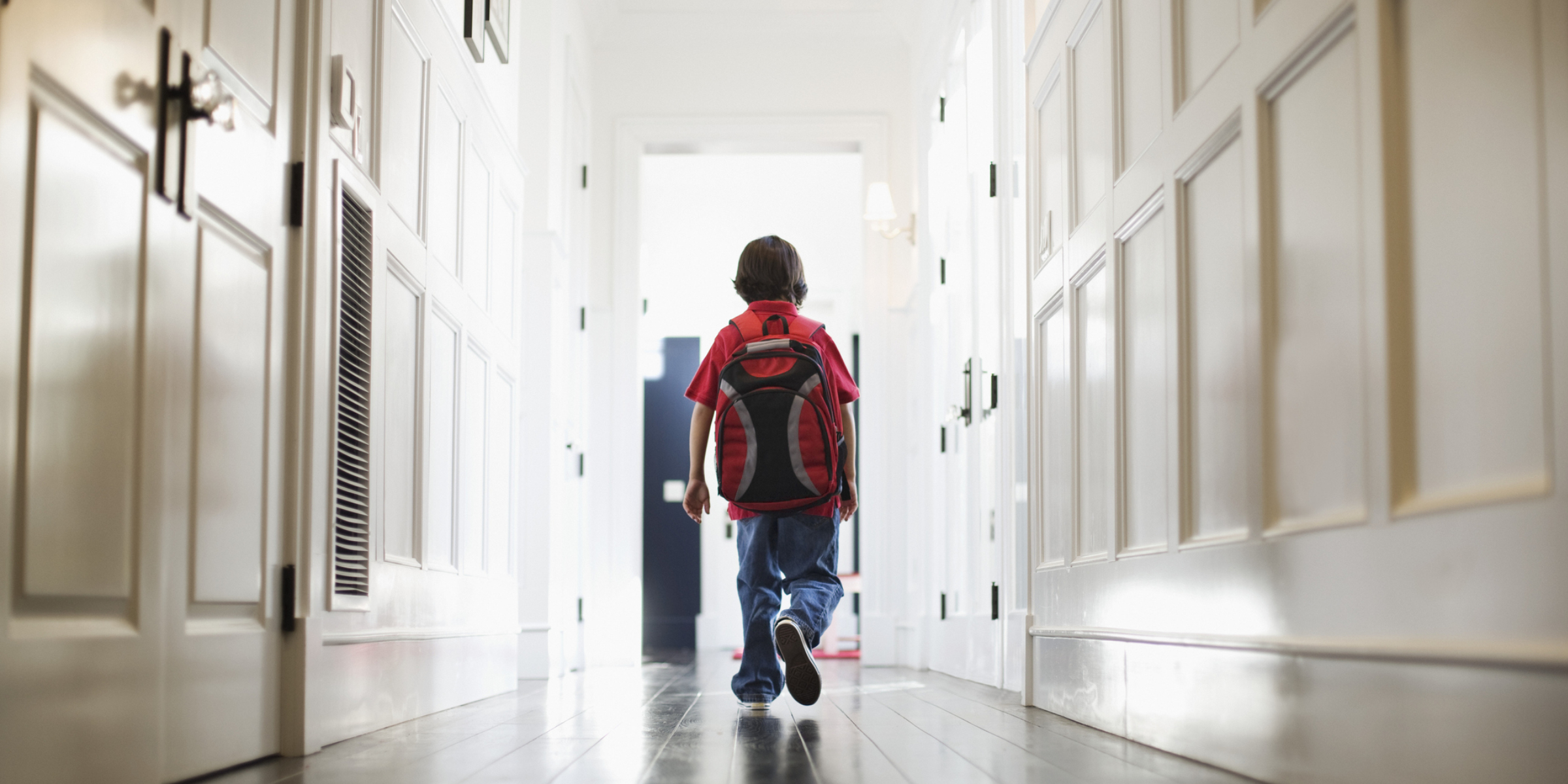 A student walks in the hallway | Source: Getty Images