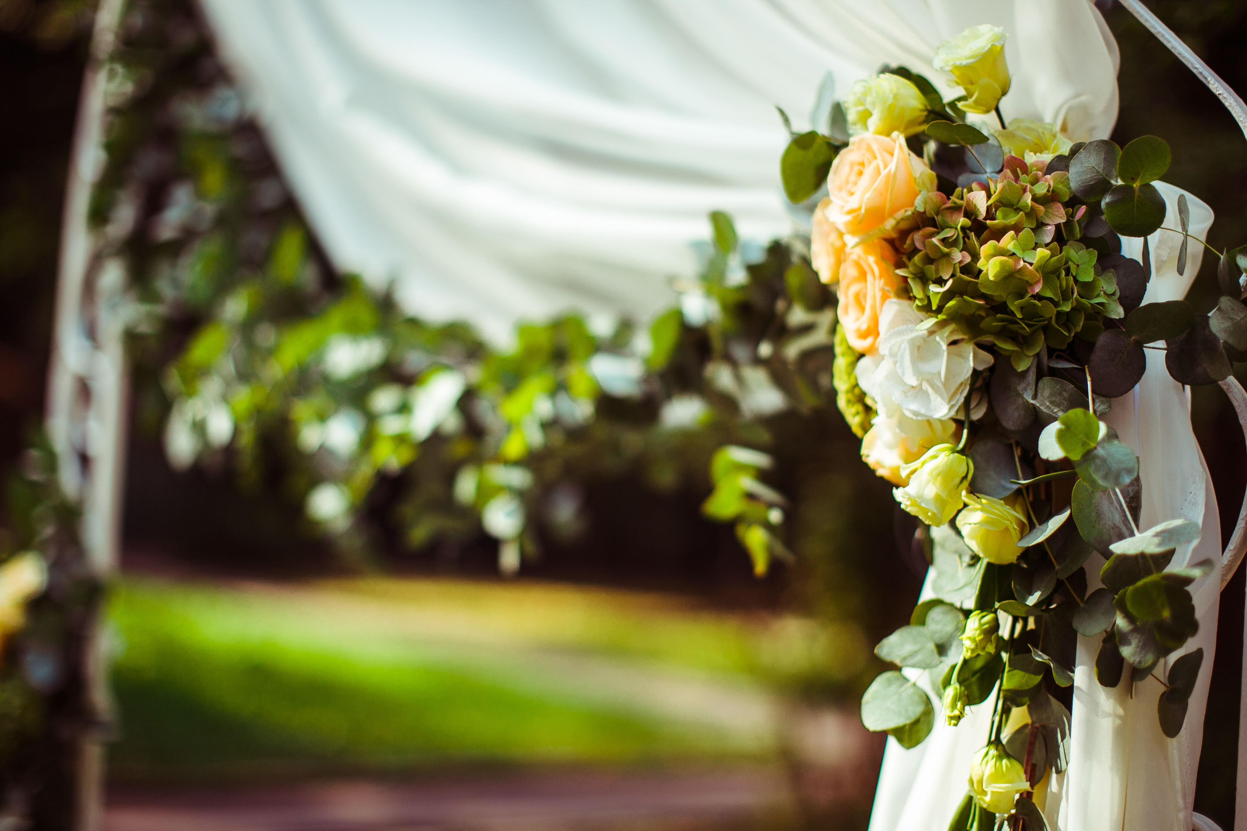 Flower decorations at a wedding altar | Source: Shutterstock