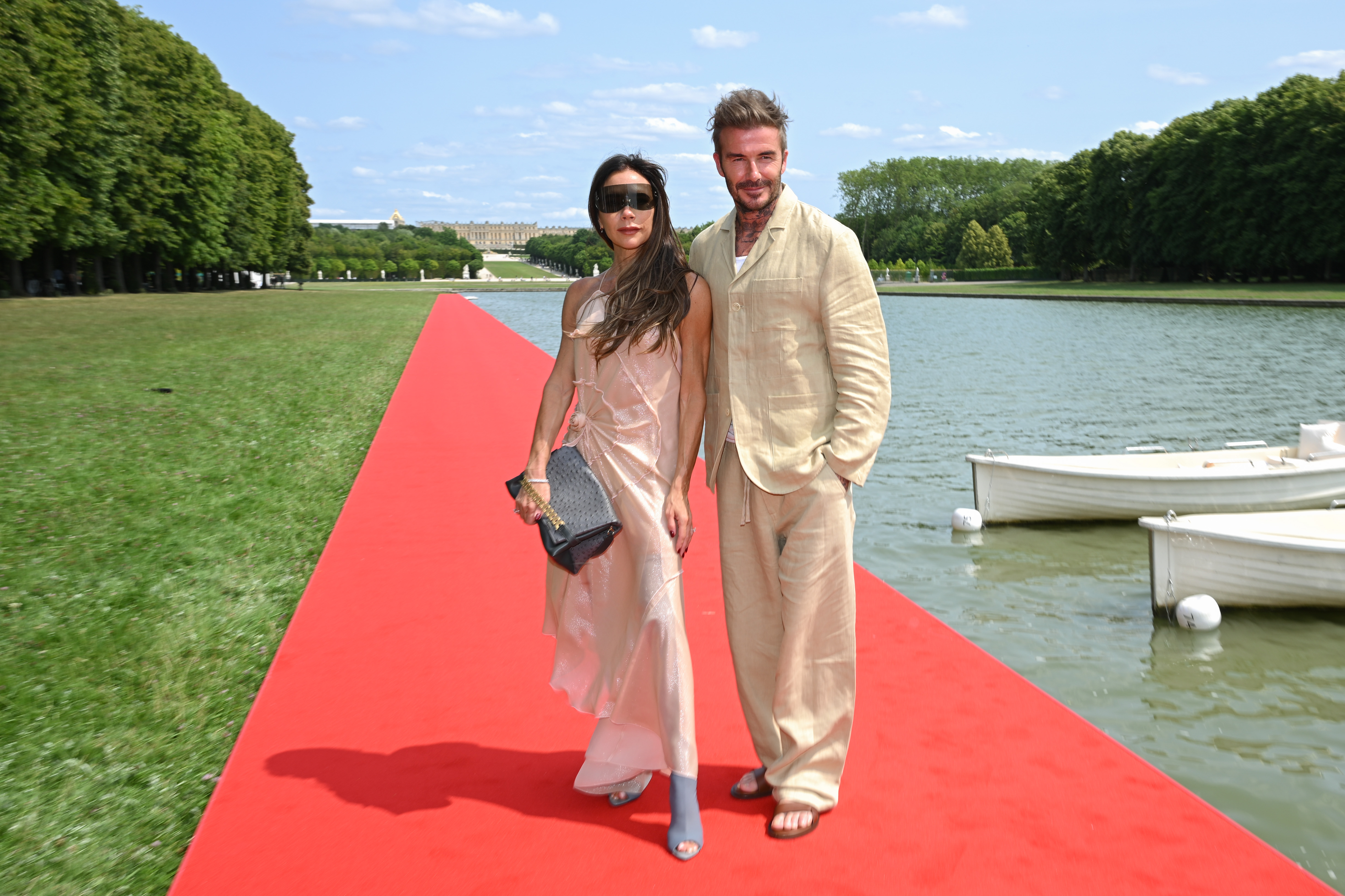 Victoria Beckham and David Beckham at the "Le Chouchou" Jacquemus' Fashion Show at Chateau de Versailles on June 26, 2023 in Versailles, France. | Source: Getty Images
