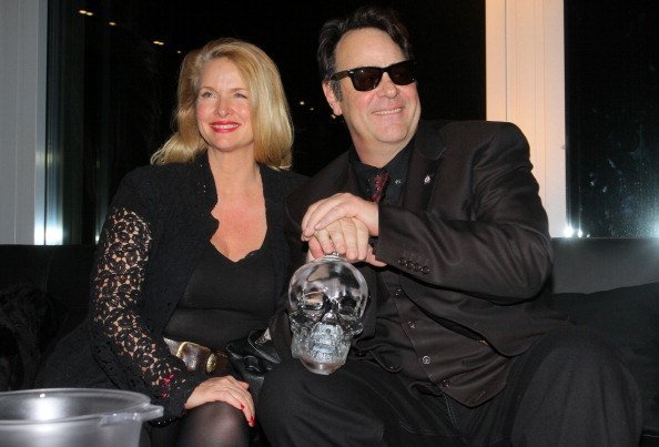 Dan Aykroyd and wife Donna Dixon celebrating the launch of his 'Crystal Head Vodka' on February 18, 2012 | Photo: Getty Images
