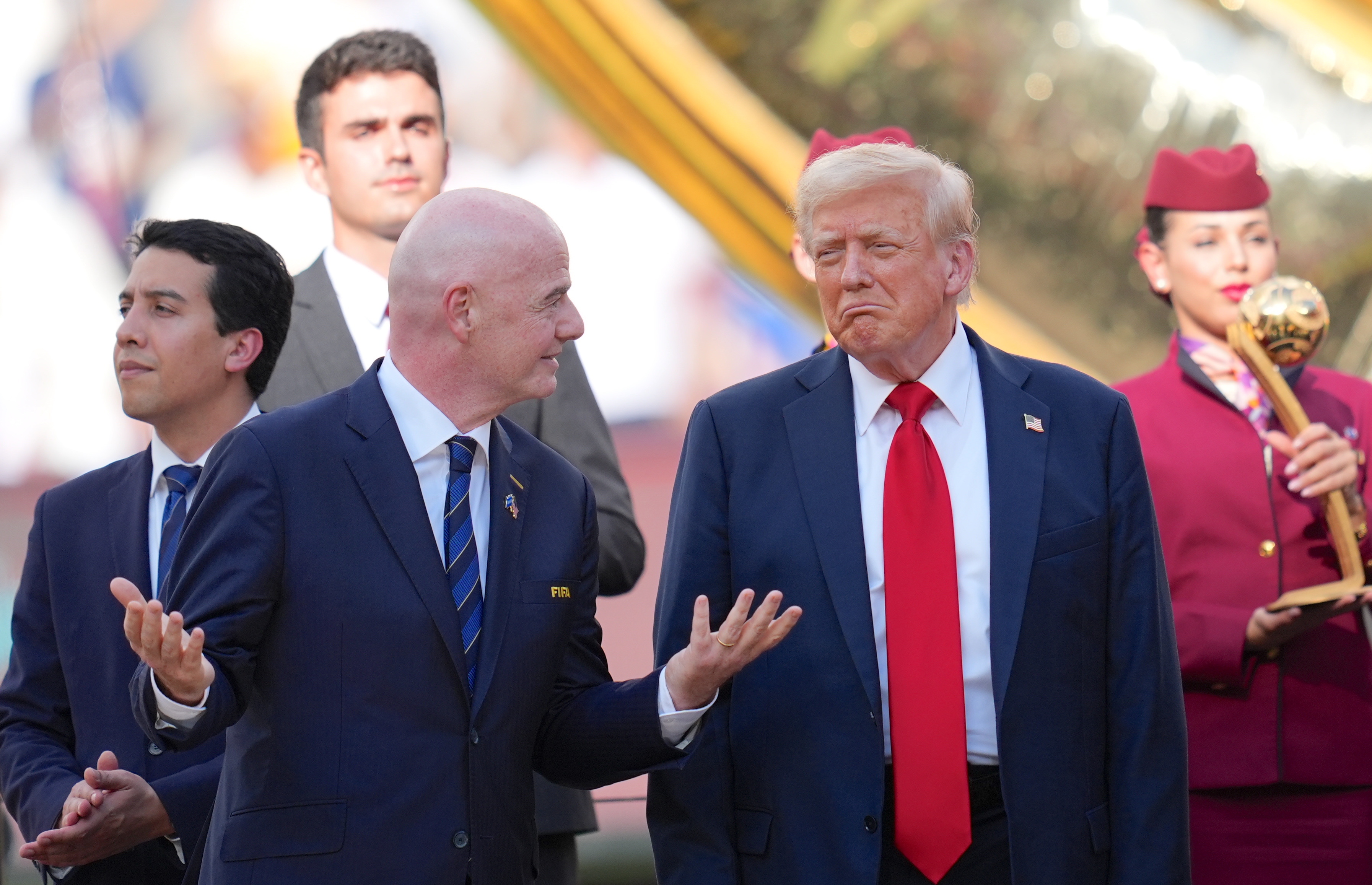 Gianni Infantino and Donald Trump while presenting medals to the players following the FIFA Club World Cup final match on July 13, 2025, in New Jersey. | Source: Getty Images