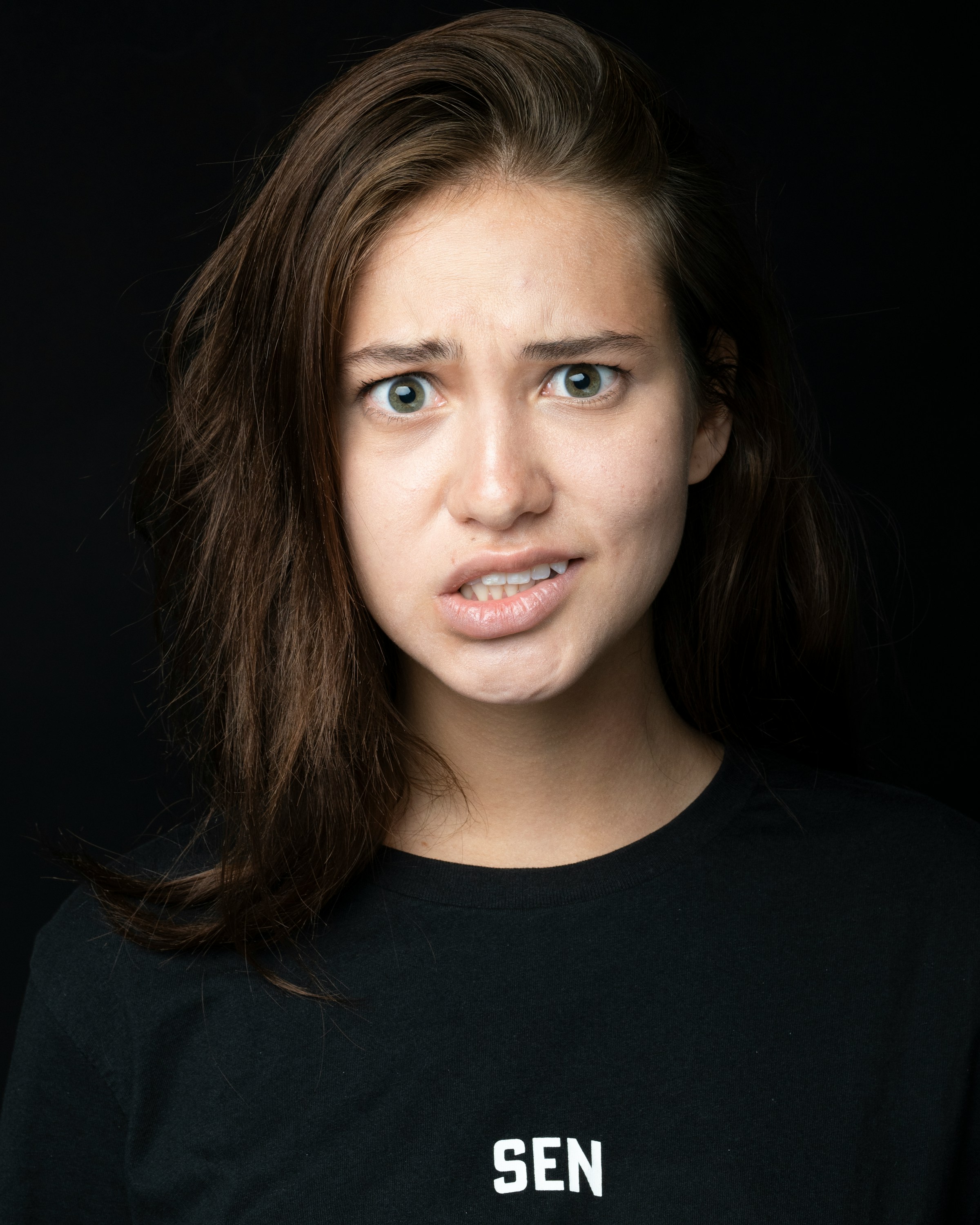 A woman grimacing | Source: Unsplash