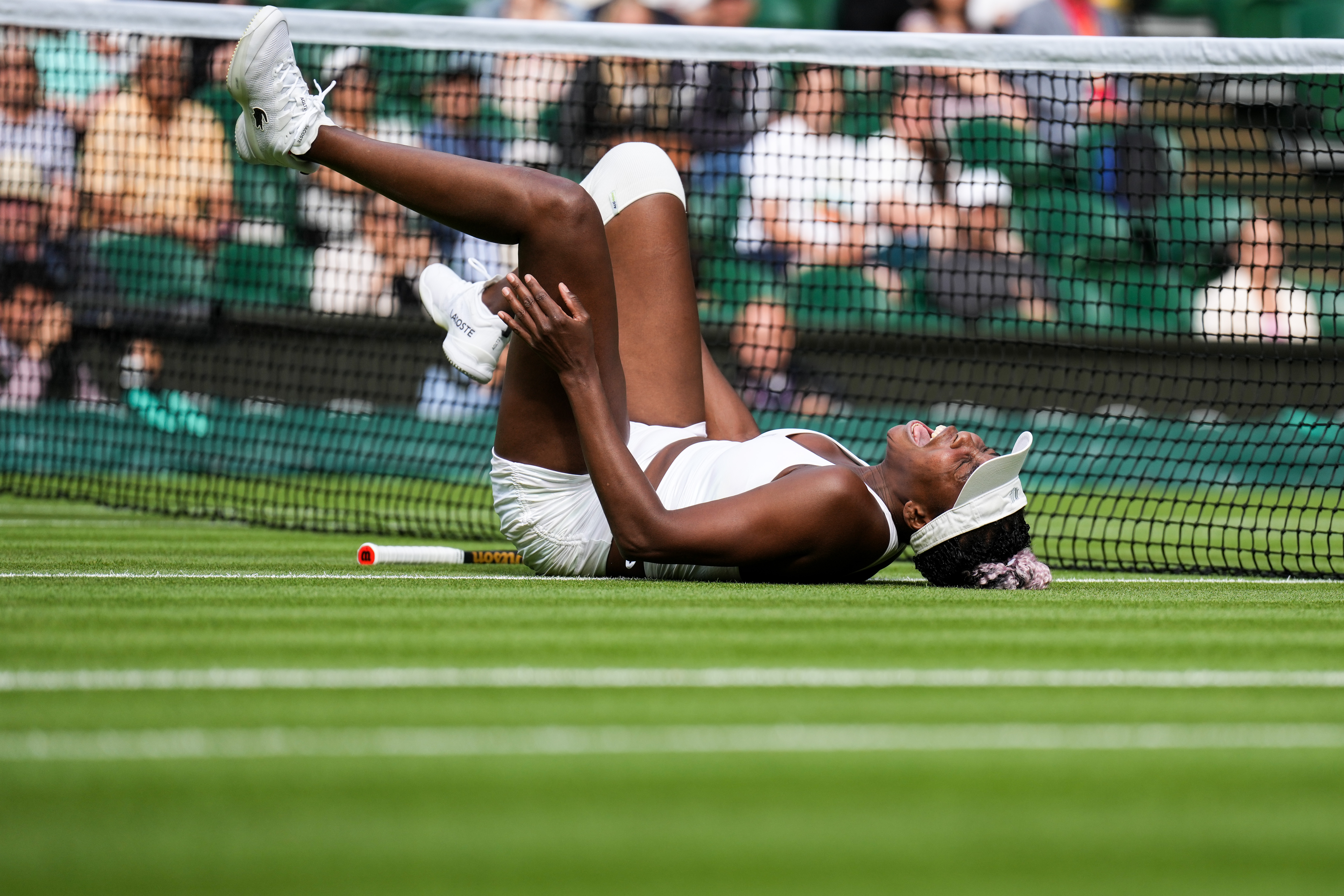 Venus Williams of the United States gets an injury in the Women's Singles first round match against Elina Svitolina at All England Lawn Tennis and Croquet Club on July 03, 2023, in London, England. | Source: Getty Images