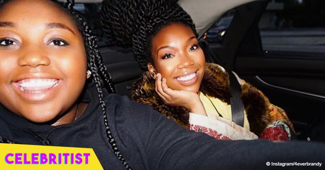 Brandy's 16-year-old daughter rocks orange hat in new pic after cutting off her long hair