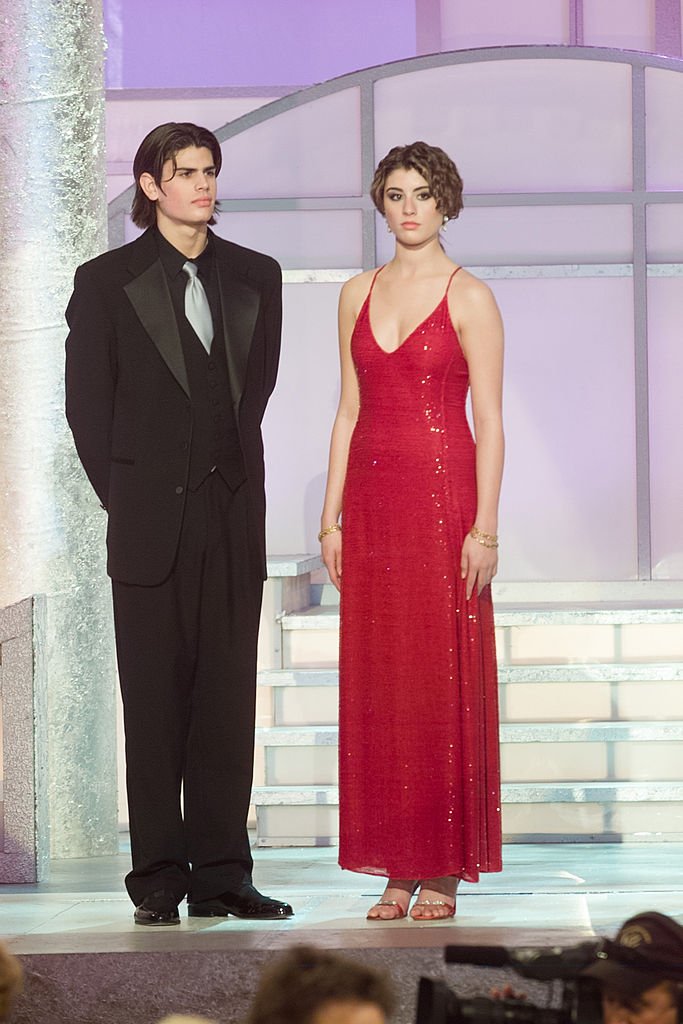 Mr. and Miss Golden Globe A.J. Lamas and Dominik Garcia-Lorido are seen on stage at the 60th Annual Golden Globe Awards held at the Beverly Hilton Hotel on January 19, 2003 | Photo: Getty Images
