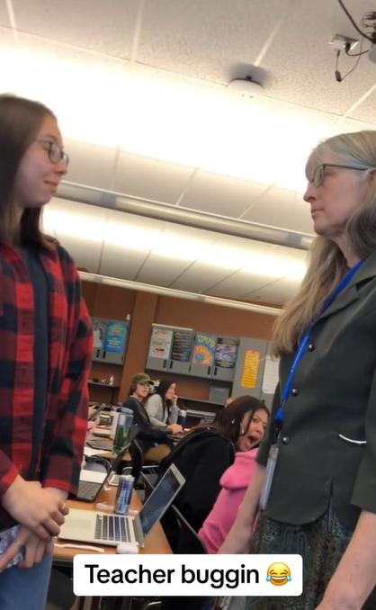 A teacher having a confrontation with a student in her class in a TikTok video uploaded on January 7, 2024 | Source: TikTok/specere