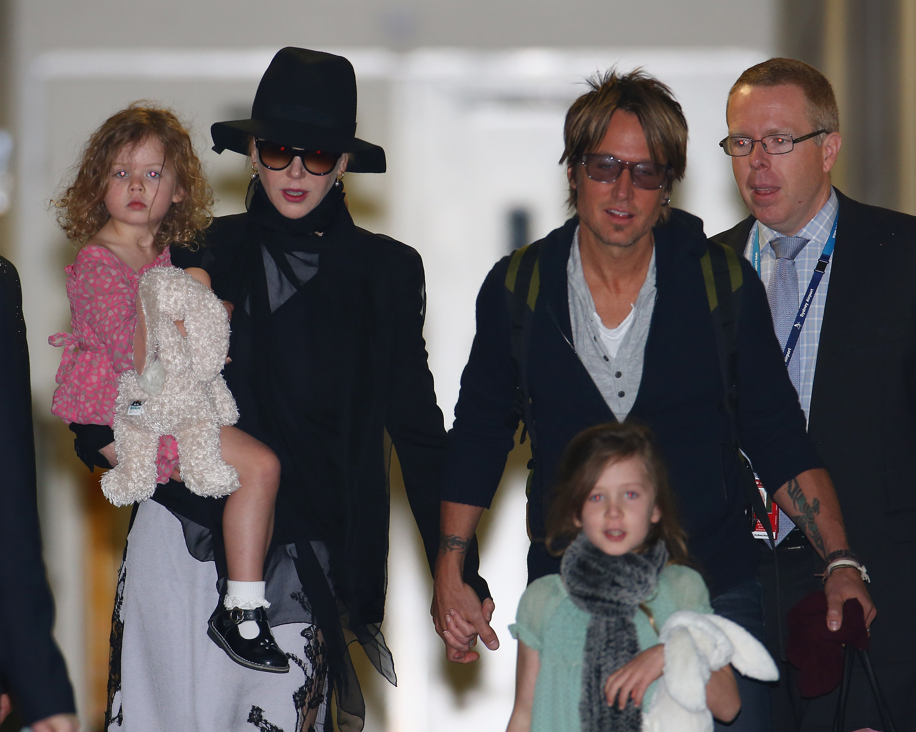 Nicole Kidman, Faith Urban, Keith Urban, and Sunday Rose Urban arrive at Sydney International Airport in Sydney, Australia on June 11, 2014. | Source: Getty Images