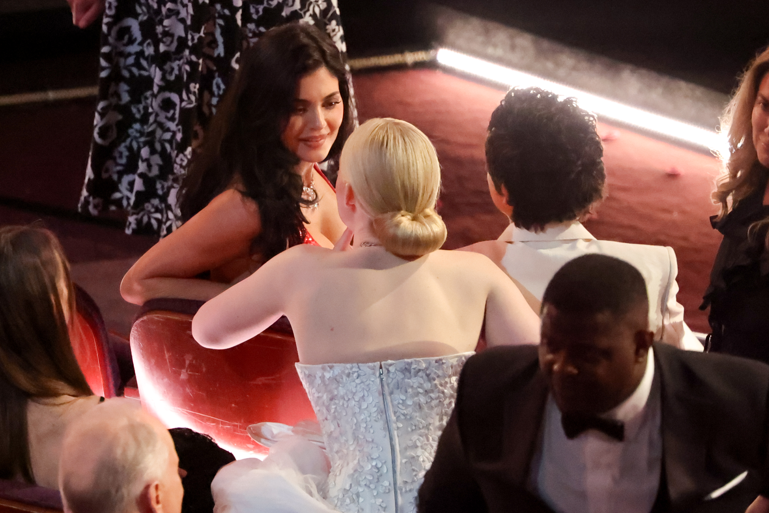 Kylie Jenner speaks while seated beside Timothée Chalamet at the 98th Academy Awards | Source: Getty Images