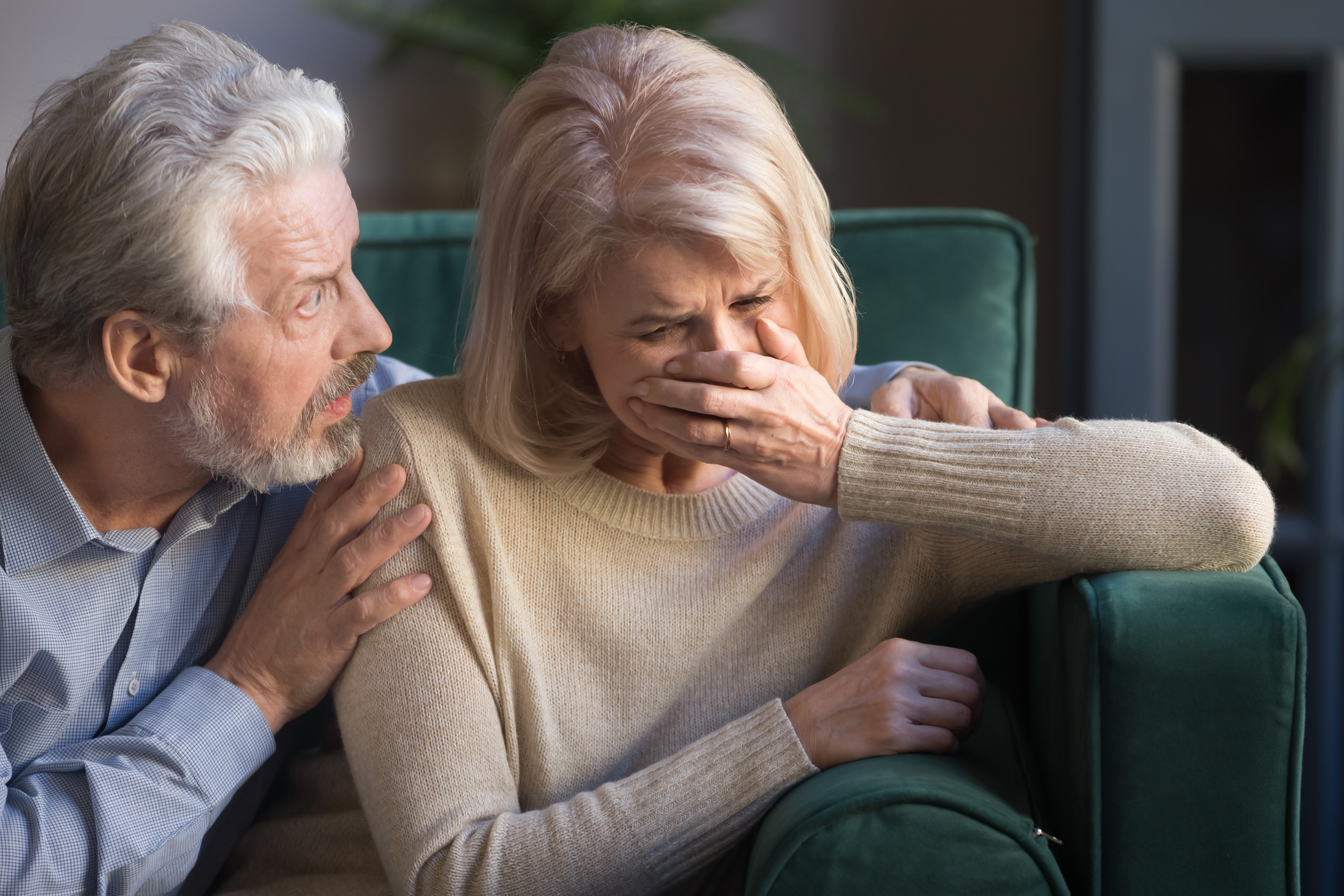 Husband comforts anxious wife | Source: Shutterstock