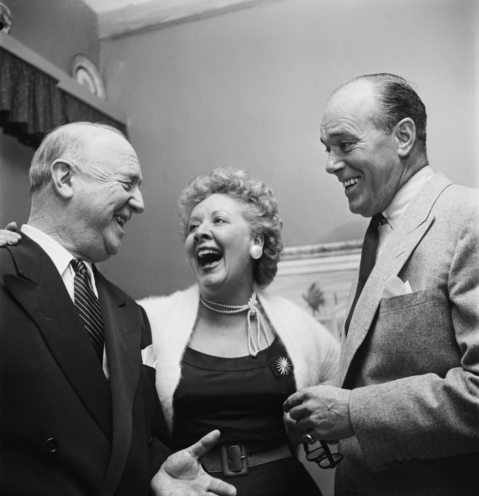 Actress Vivian Vance with William Frawley (left), and her husband, actor Philip Ober (right), at home, USA, circa 1955. | Photo: Getty Images