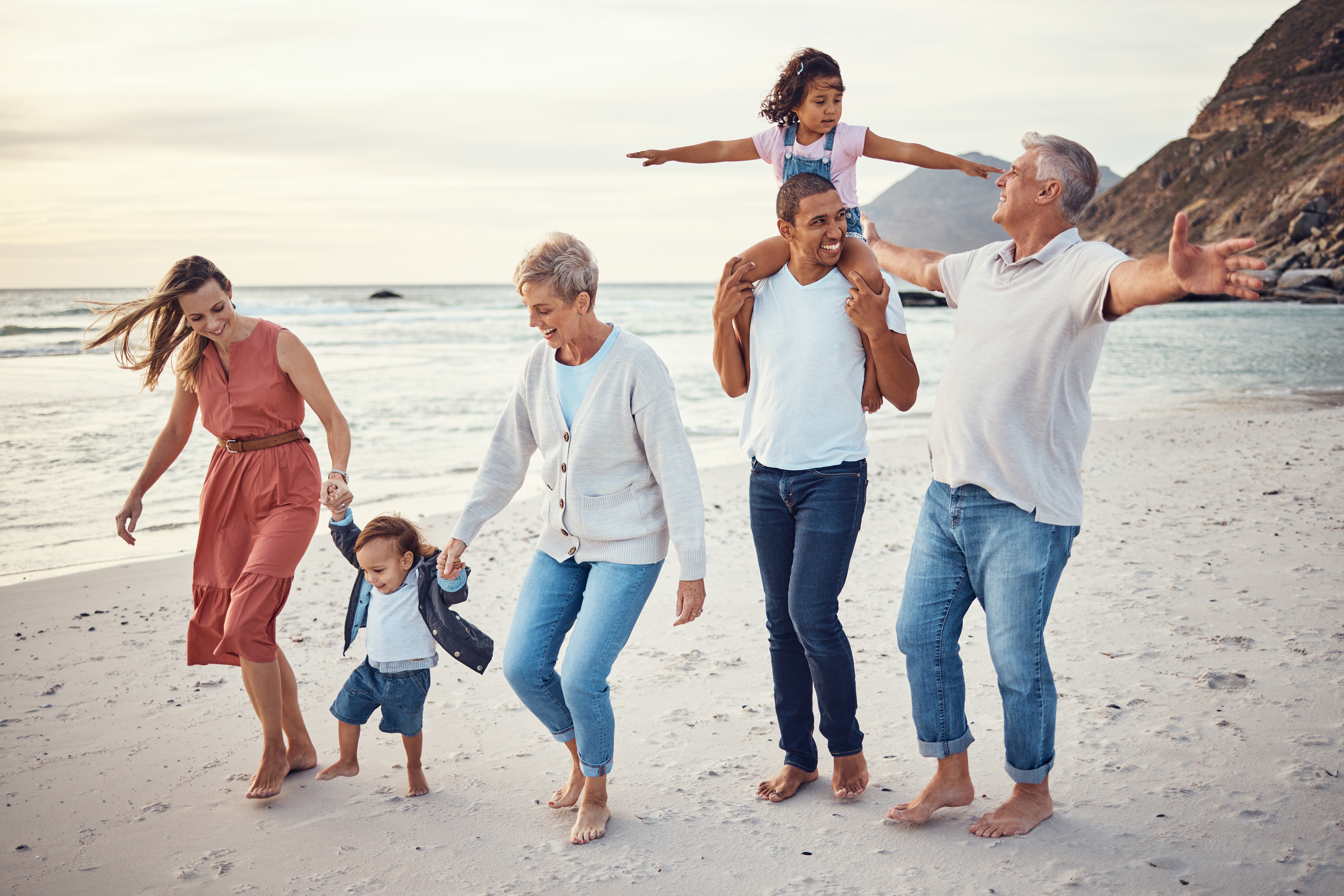 Family on the beach | Shutterstock