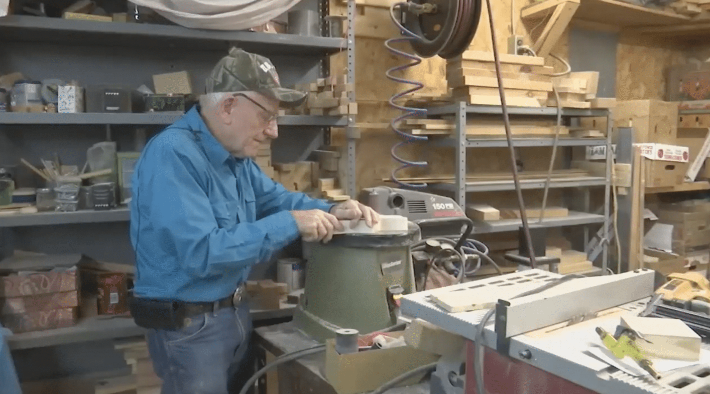 Jim Annis pictured working in his makeshift toy factory | Source: facebook.com/WorldNewsTonight