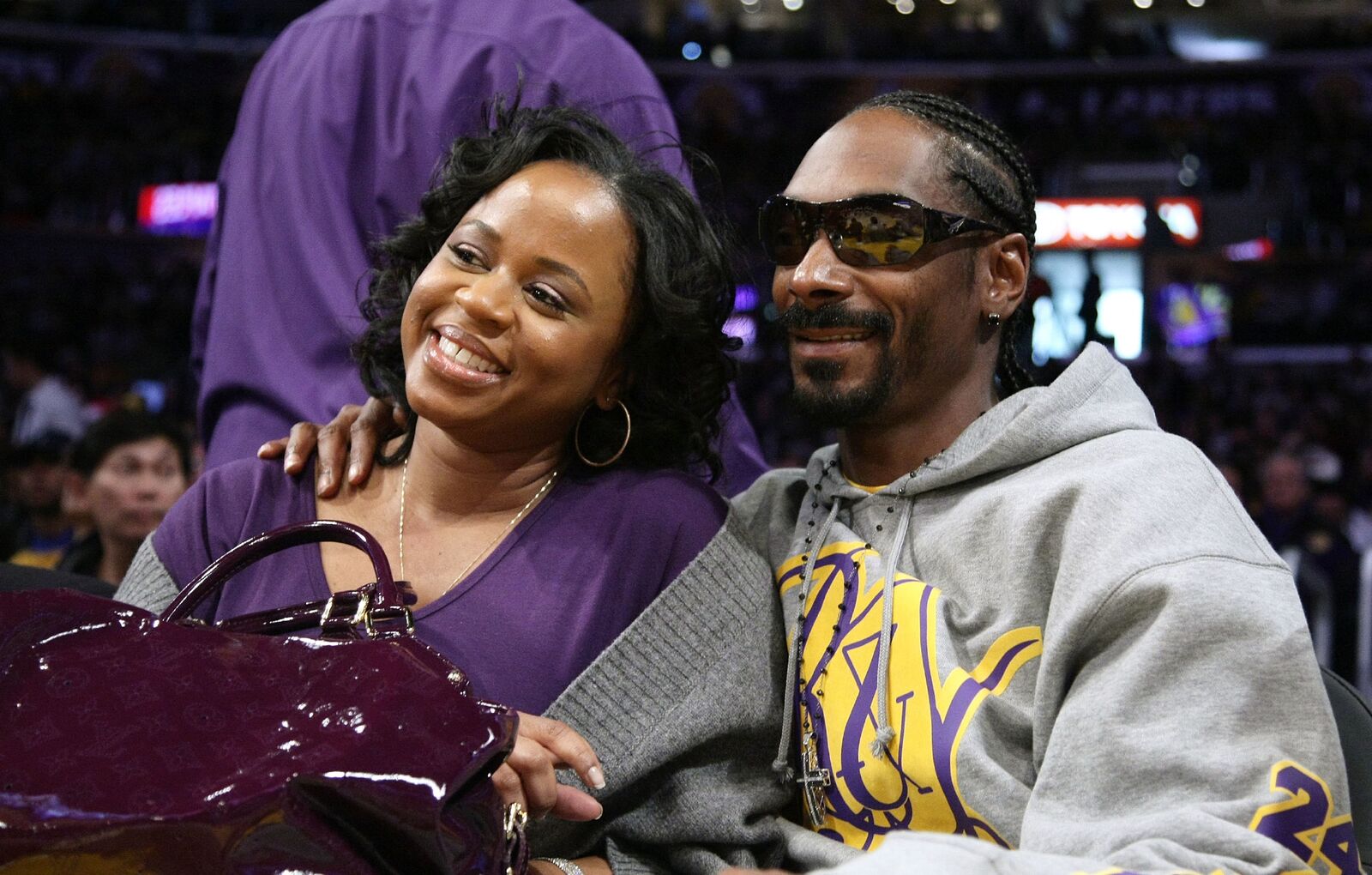 Rapper Snoop Dogg (R) and his wife Shante Broadus (L) attend the Los Angeles Lakers vs Boston Celtics game at the Staples Center. | Photo: Getty Images