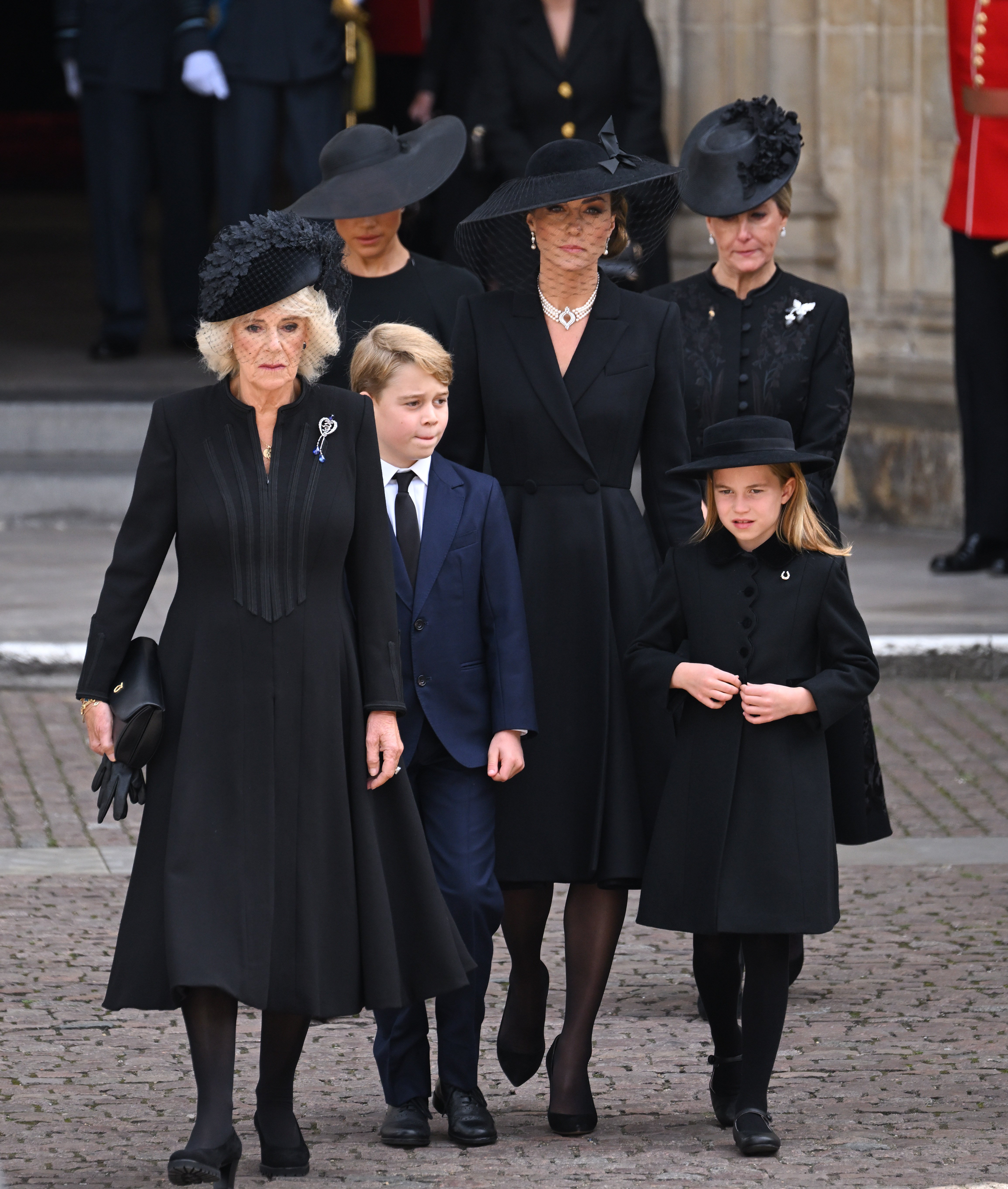 amilla, Queen Consort, Meghan, Duchess of Sussex, Prince George of Wales, Catherine, Princess of Wales, Princess Charlotte of Wales and Sophie, Countess of Wessex during the State Funeral of Queen Elizabeth II at Westminster Abbey on September 19, 2022 in London, England | Source: Getty Images 