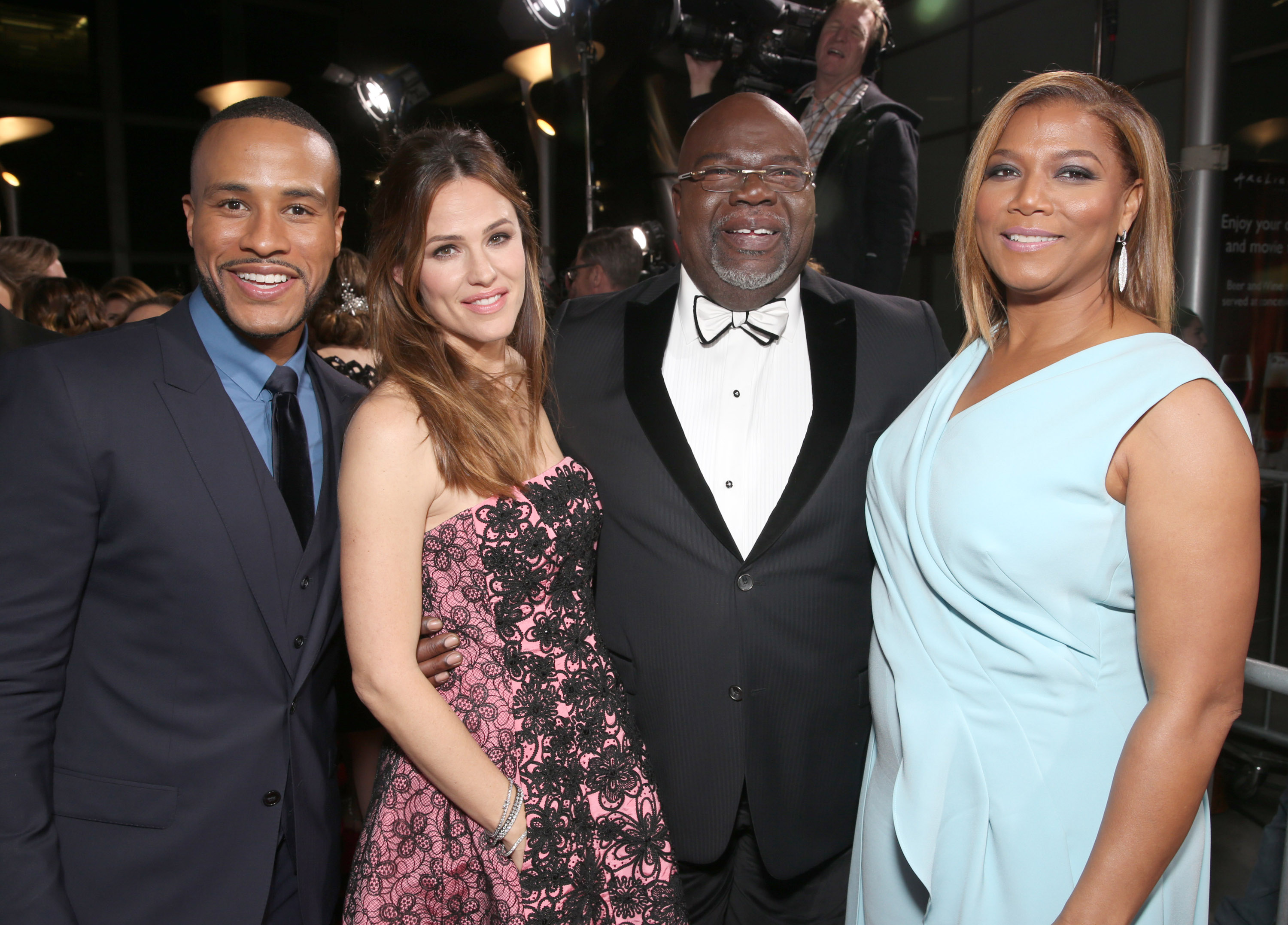 Producer DeVon Franklin, actress Jennifer Garner, producer Bishop T.D. Jakes, and actress Queen Latifah on March 9, 2016, in Hollywood, California | Source: Getty Images