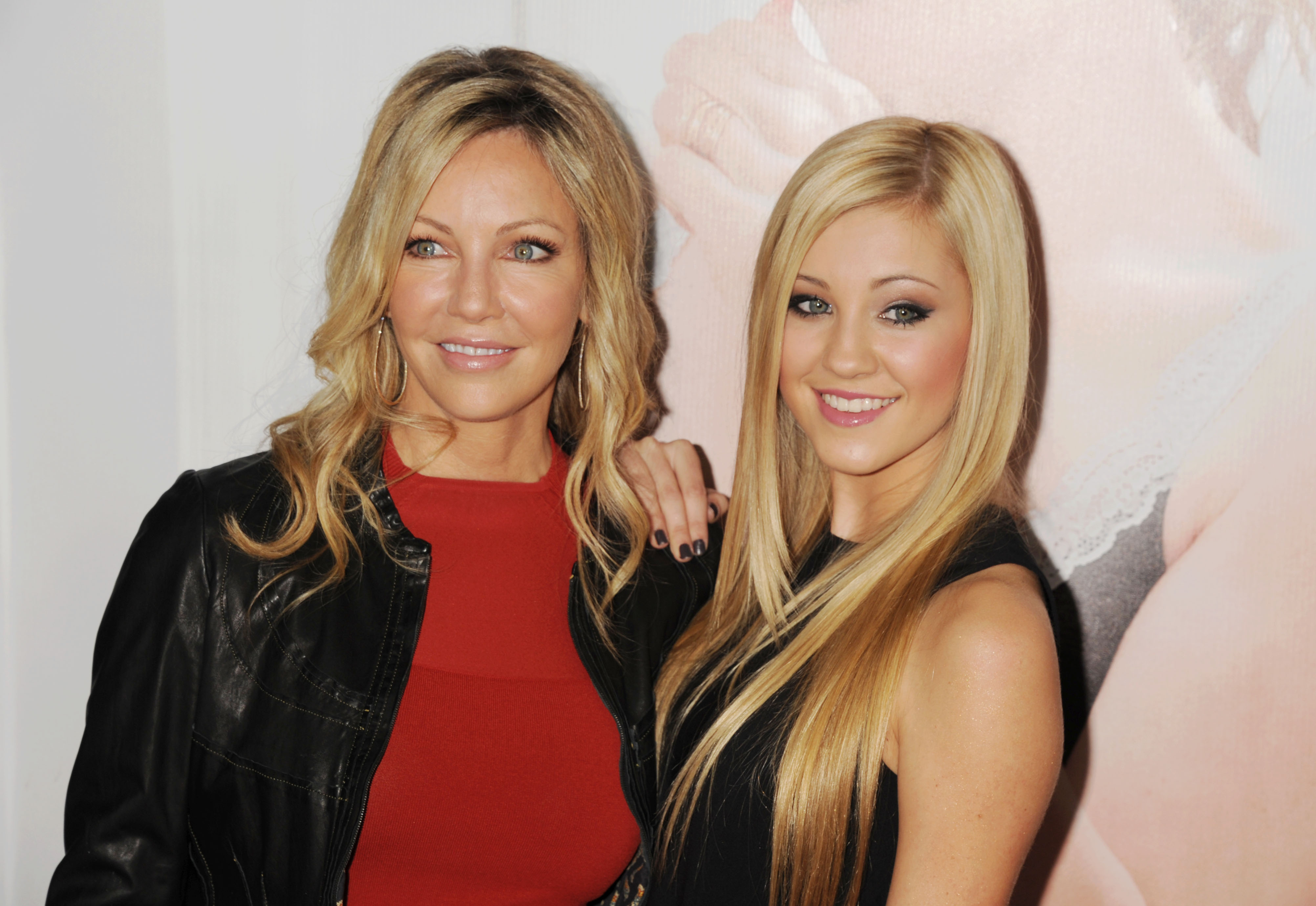 Heather Locklear and Ava Sambora arrive at the "This Is 40" Los Angeles Premiere at Grauman's Chinese Theatre on December 12, 2012 in Hollywood, California | Source: Getty Images