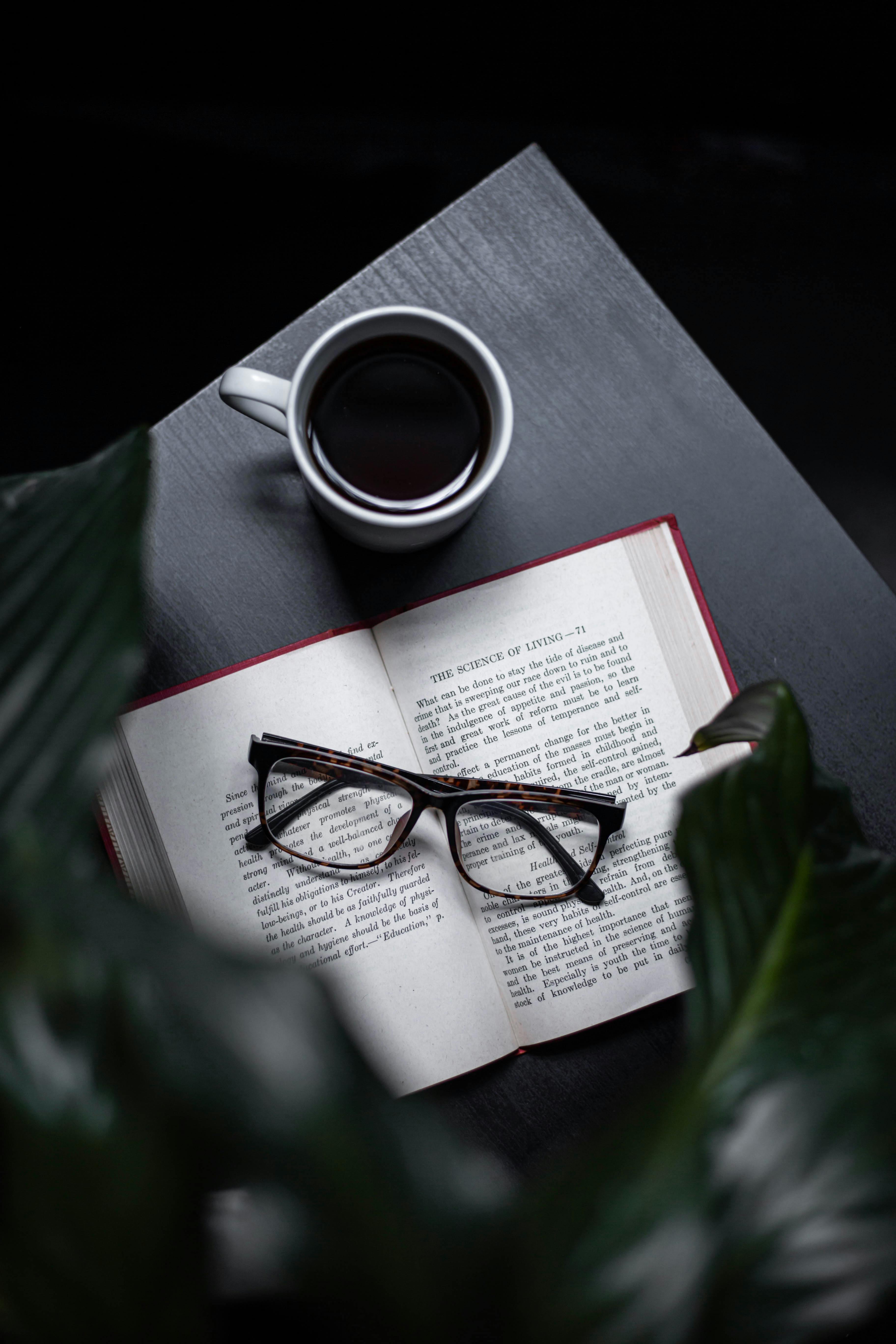 A book and a cup of coffee | Source: Pexels