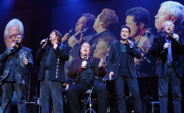 The Osmonds perform during their 50th anniversary tour at Wembley Arena in London, England | Photo: Getty Images