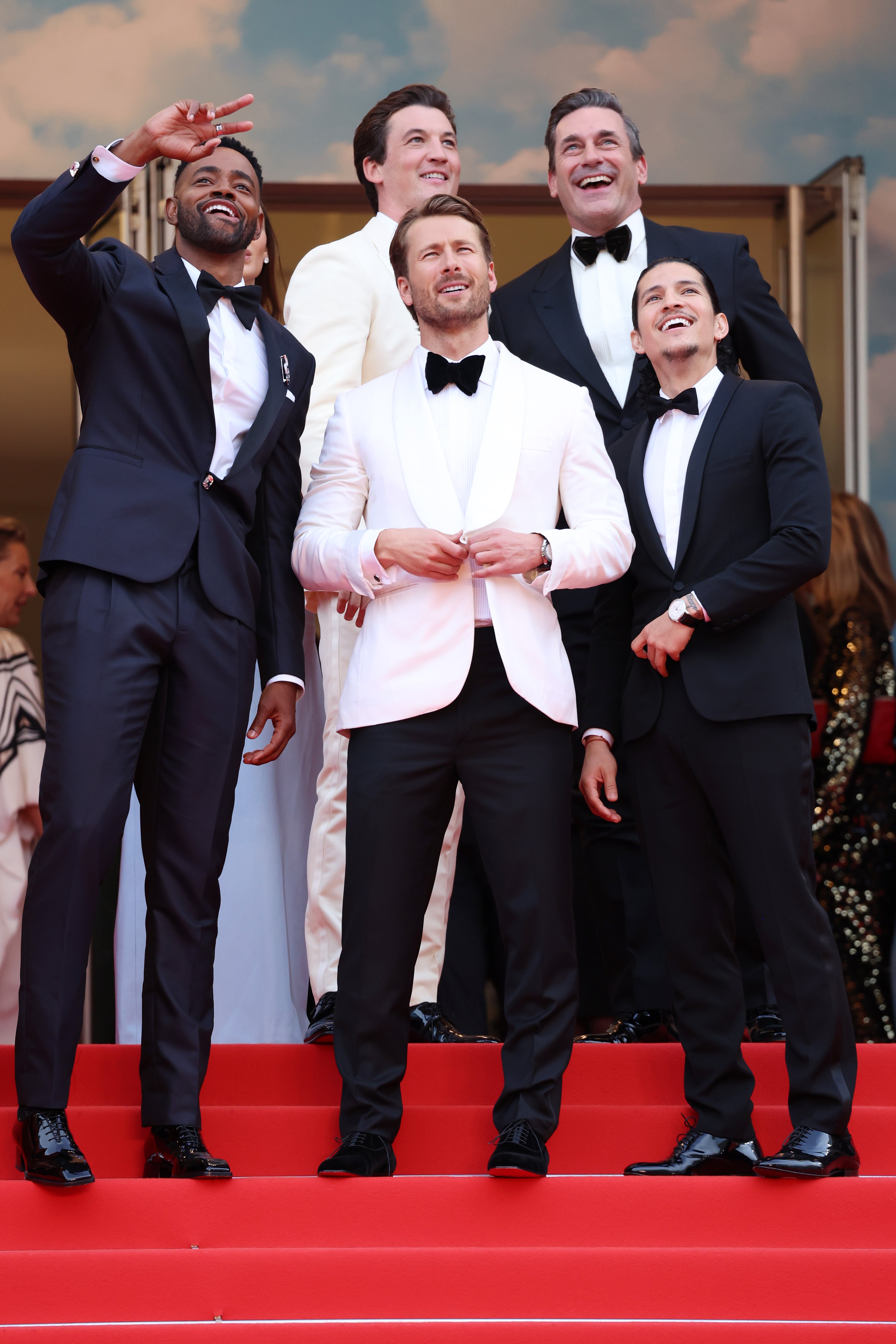 Jay Ellis, Miles Teller, Glen Powell, Jon Hamm and Danny Ramirez on May 18, 2022 in Cannes, France | Source: Getty Images 