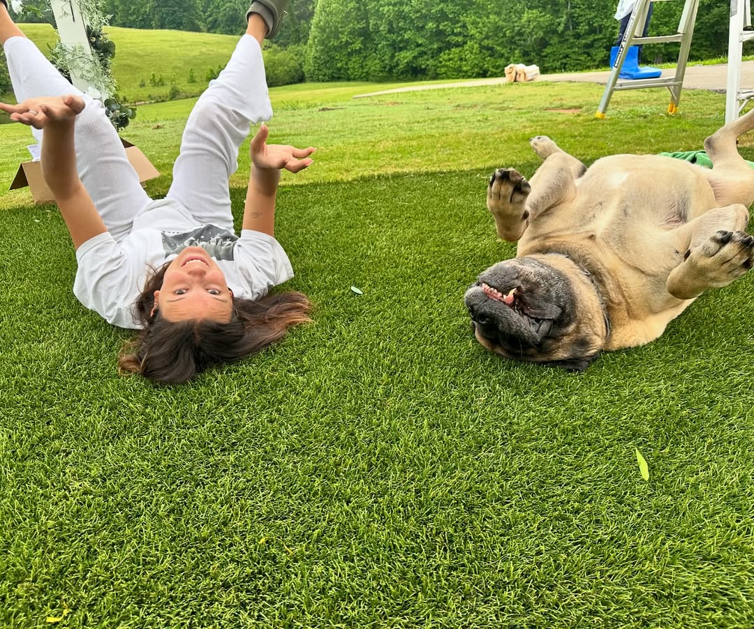 Millie Bobby Brown Bongiovi with one of her dogs from a post dated September 3, 2024. | Source: Instagram/milliebobbybrown