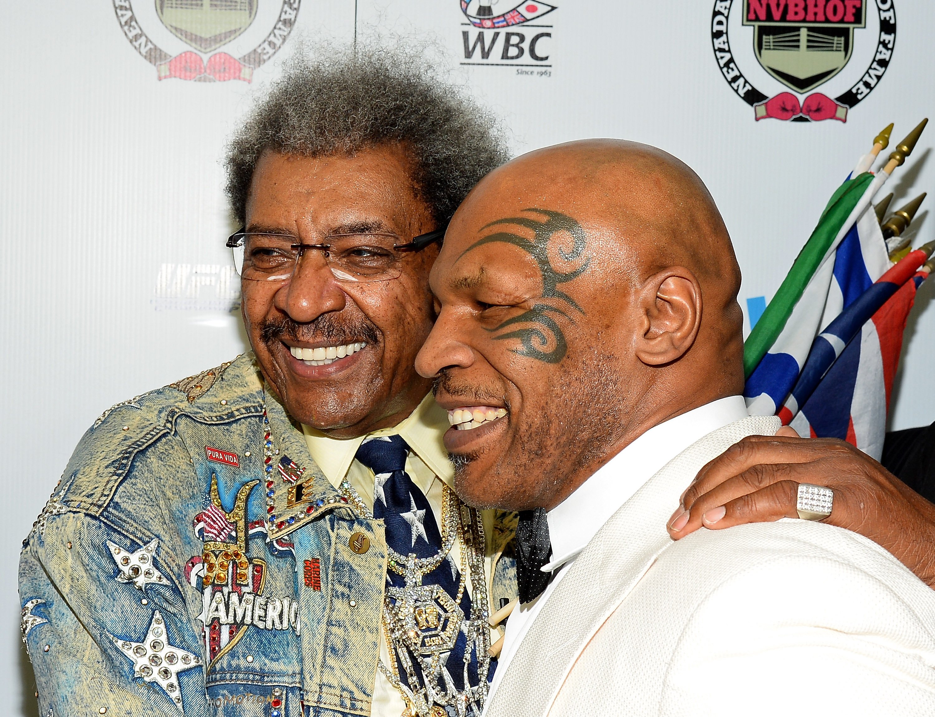 Boxing promoter and inductee Don King (L) and former boxer and inductee Mike Tyson arrive at the Nevada Boxing Hall of Fame inaugural induction gala. | Source: Getty Images