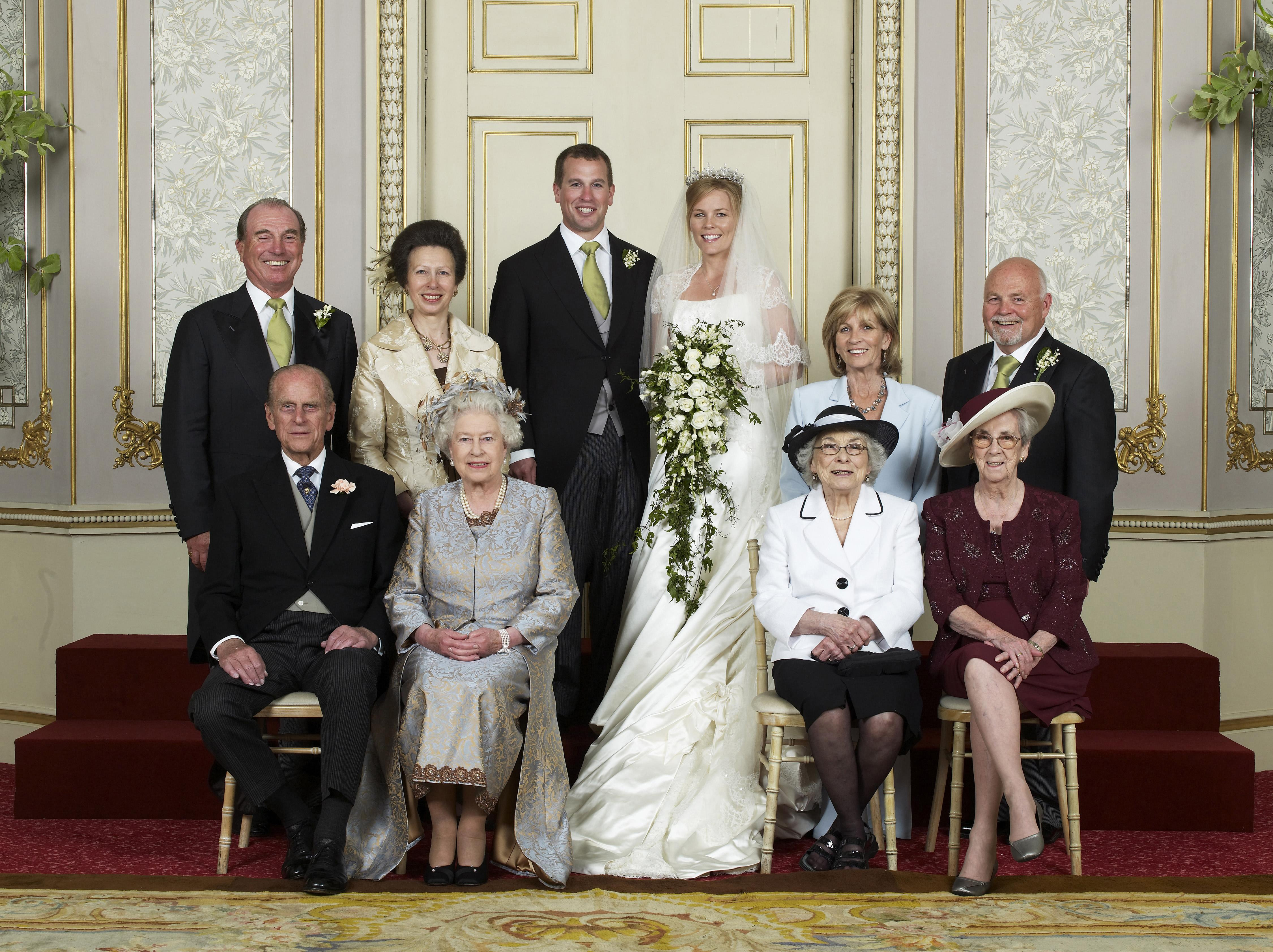 Wedding group of Peter Phillips and Autumn at Frogmore House (seated left to right front row) The Duke of Edinburgh, Queen Elizabeth II, Mrs Ivy Kelly, Mrs Edith McCarthy, (standing left to right) Capt. Mark Phillips, The Princess Royal, Mr Peter Philips, Mrs Peter Phillips, Mrs Kity Kelly, Mr Brian Kelly on 17 May 2008 in Windsor, England. | Source: Getty Images