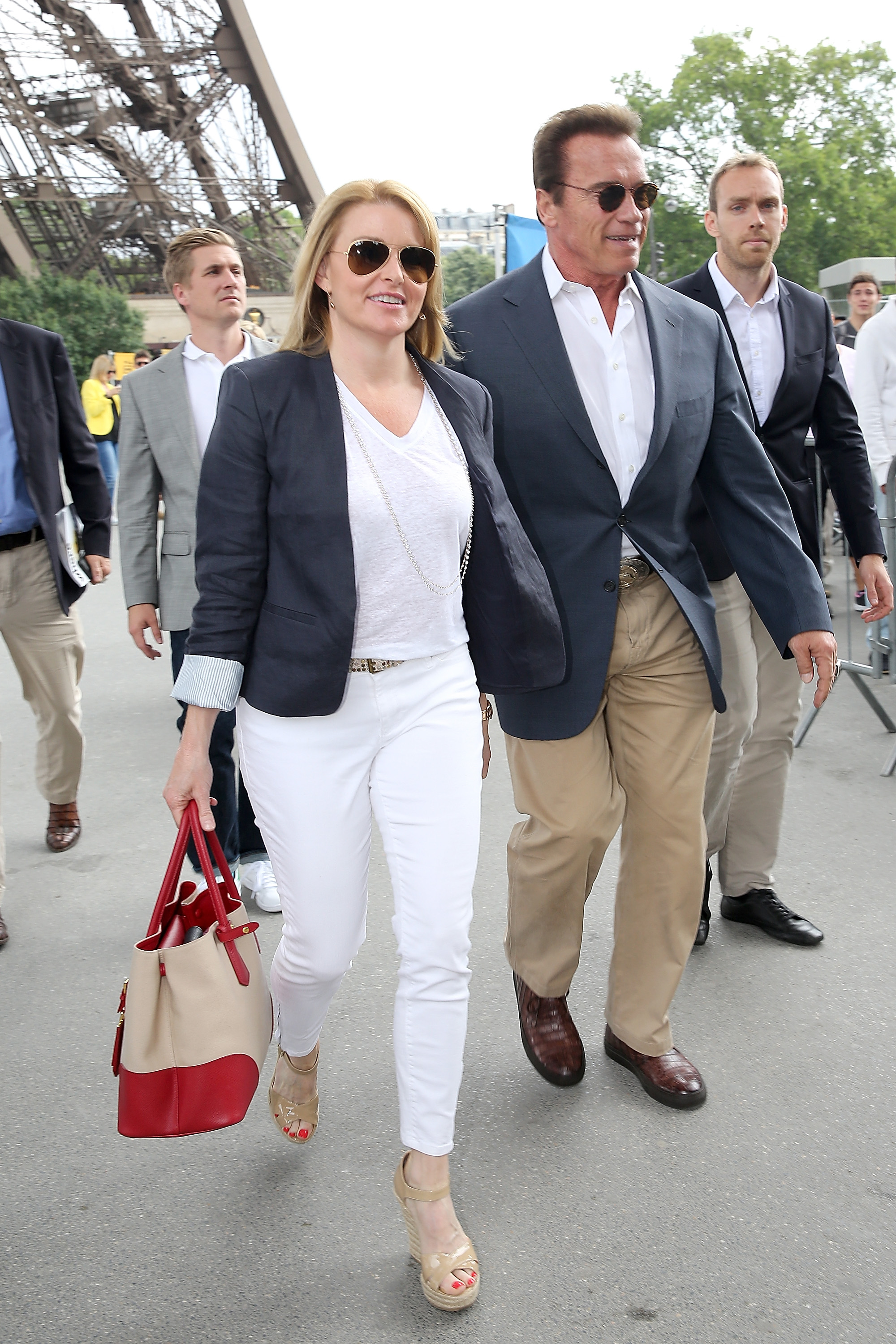 Arnold Schwarzenegger and his girlfriend Heather Milligan arrive at the Eiffel Tower for lunch at the 'Jules Vernes' restaurant on June 20, 2015 in Paris, France | Source: Getty Images