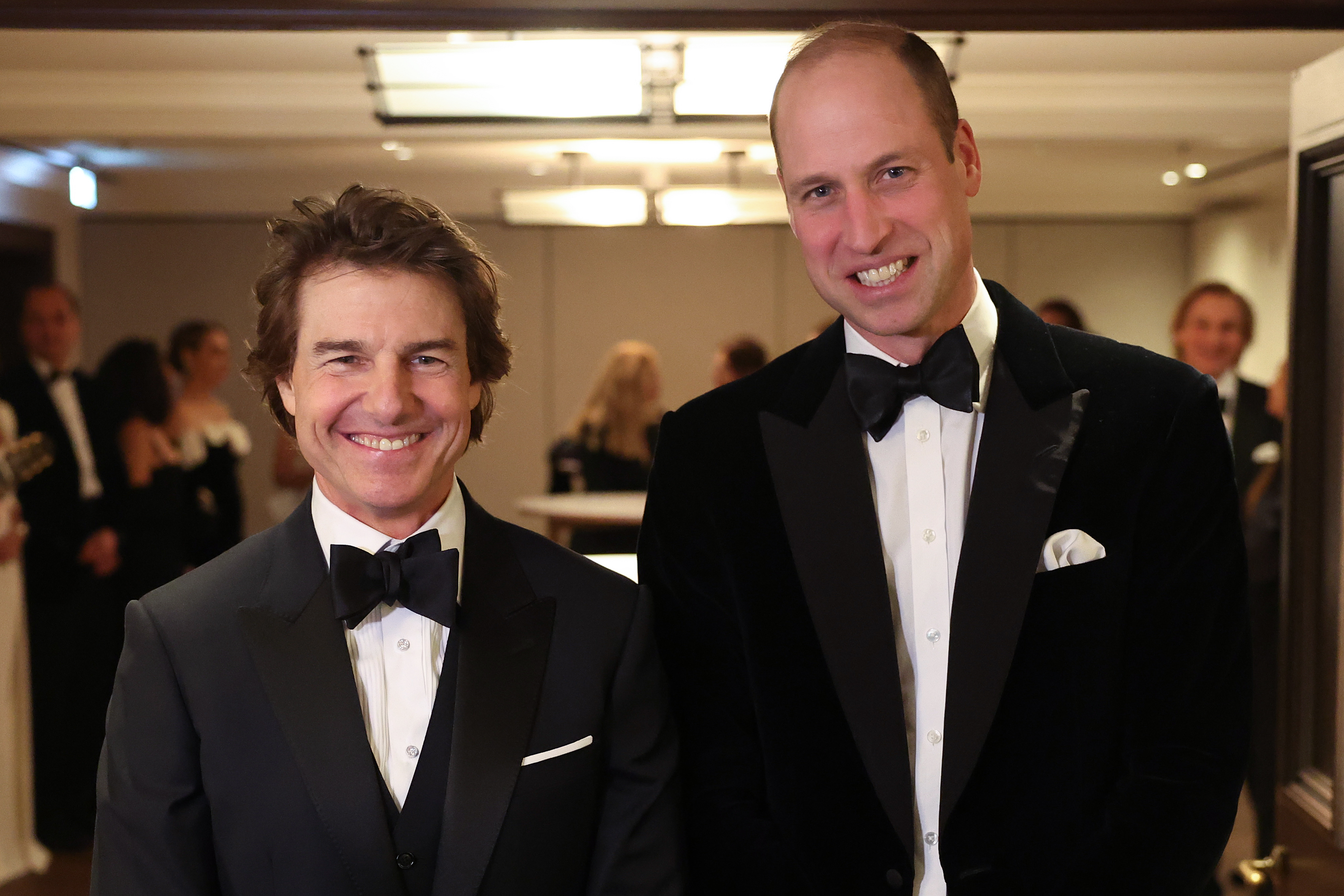 Tom Cruise poses with Britain's Prince William at the London Air Ambulance Charity Gala Dinner in London, England on February 7, 2024. | Source: Getty Images