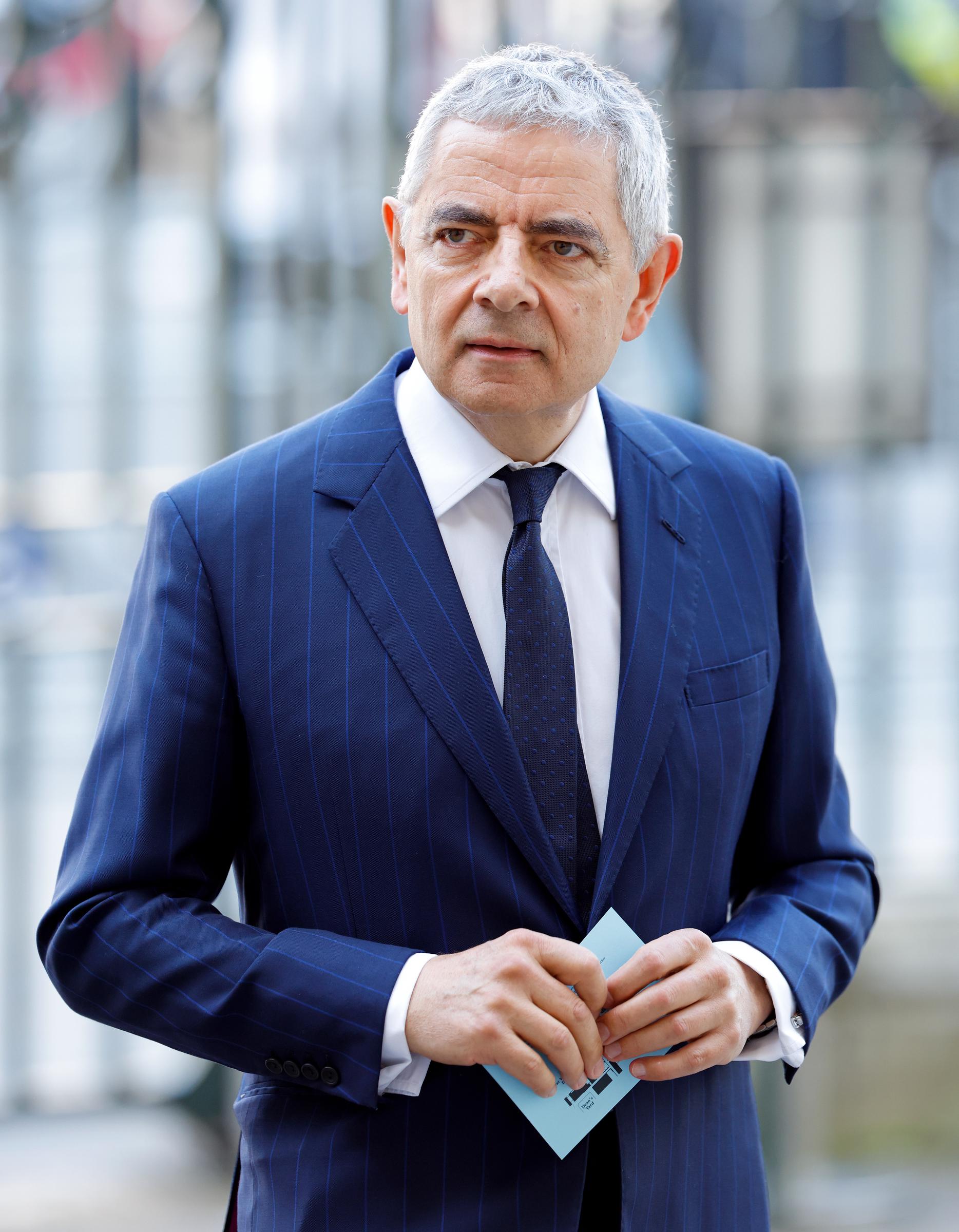 Rowan Atkinson attends a Service of Thanksgiving for the life and work of Sir Stirling Moss in London, England, on May 8, 2024. | Source: Getty Images