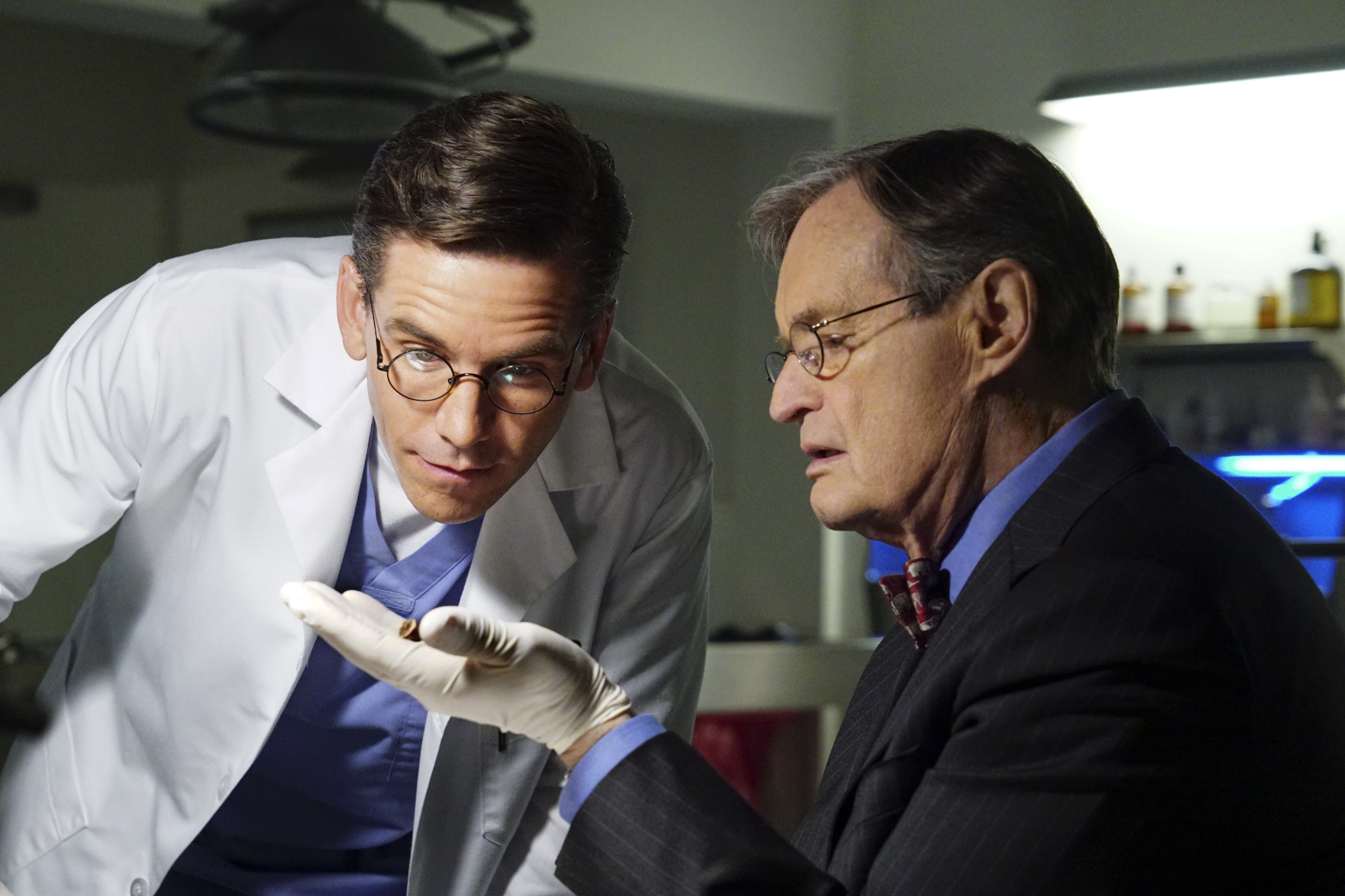 Brian Dietzen and David McCallum during the filming of "NCIS" on February 6, 2018. | Source: Getty Images