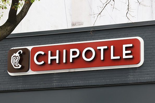 A Chipotle Mexican Grill sign is seen in the Park Slope neighborhood on April 29, 2021 in the Brooklyn borough of New York City. | Photo: Getty Images