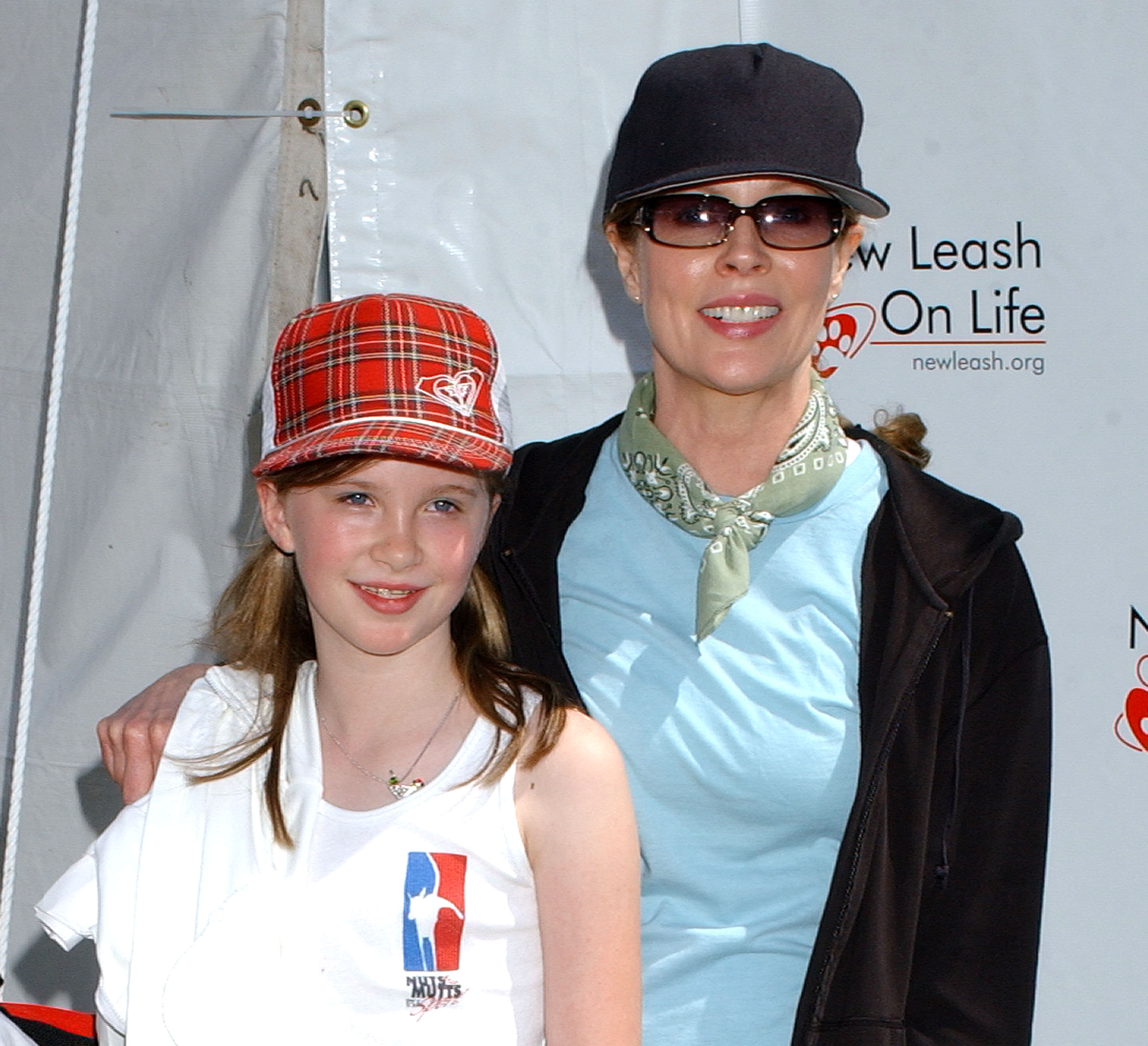 Kim Basinger and her daughter at the Nuts for Mutts Celebrity Judged Dog Show in Woodland Hills, California, 2005. | Source: Getty Images