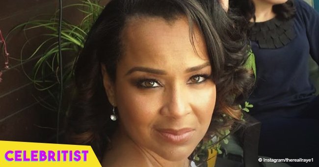 LisaRaye McCoy, 51, flaunts washboard abs in top & leggings after showing off her engagement ring