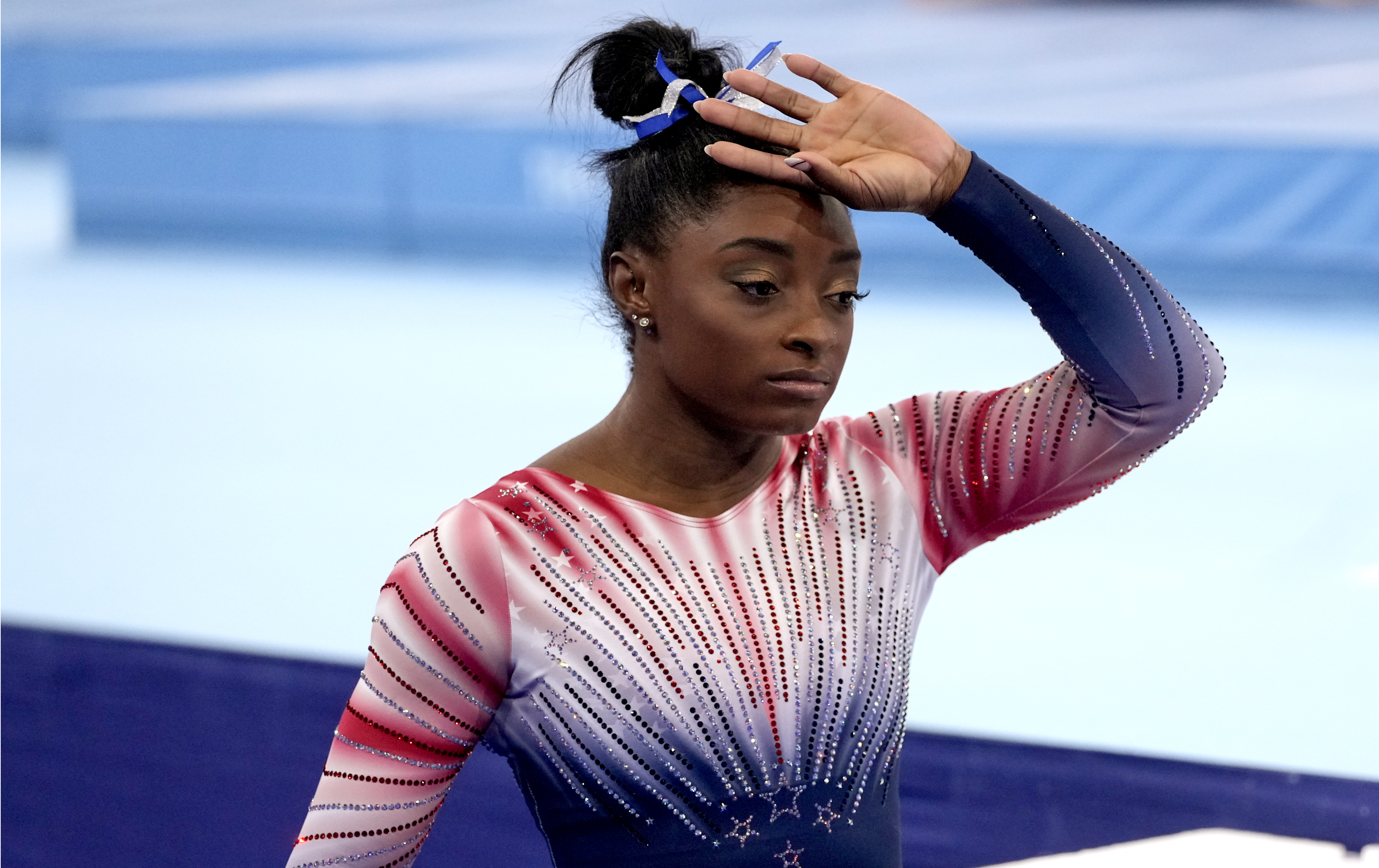 Simone Biles of Team United States getting ready to compete in the Tokyo 2020 Olympic Games Women's Gymnastics Balance Beam Final at Ariake Gymnastics Center on Tuesday, August 3, 2021 | Source: Getty Images