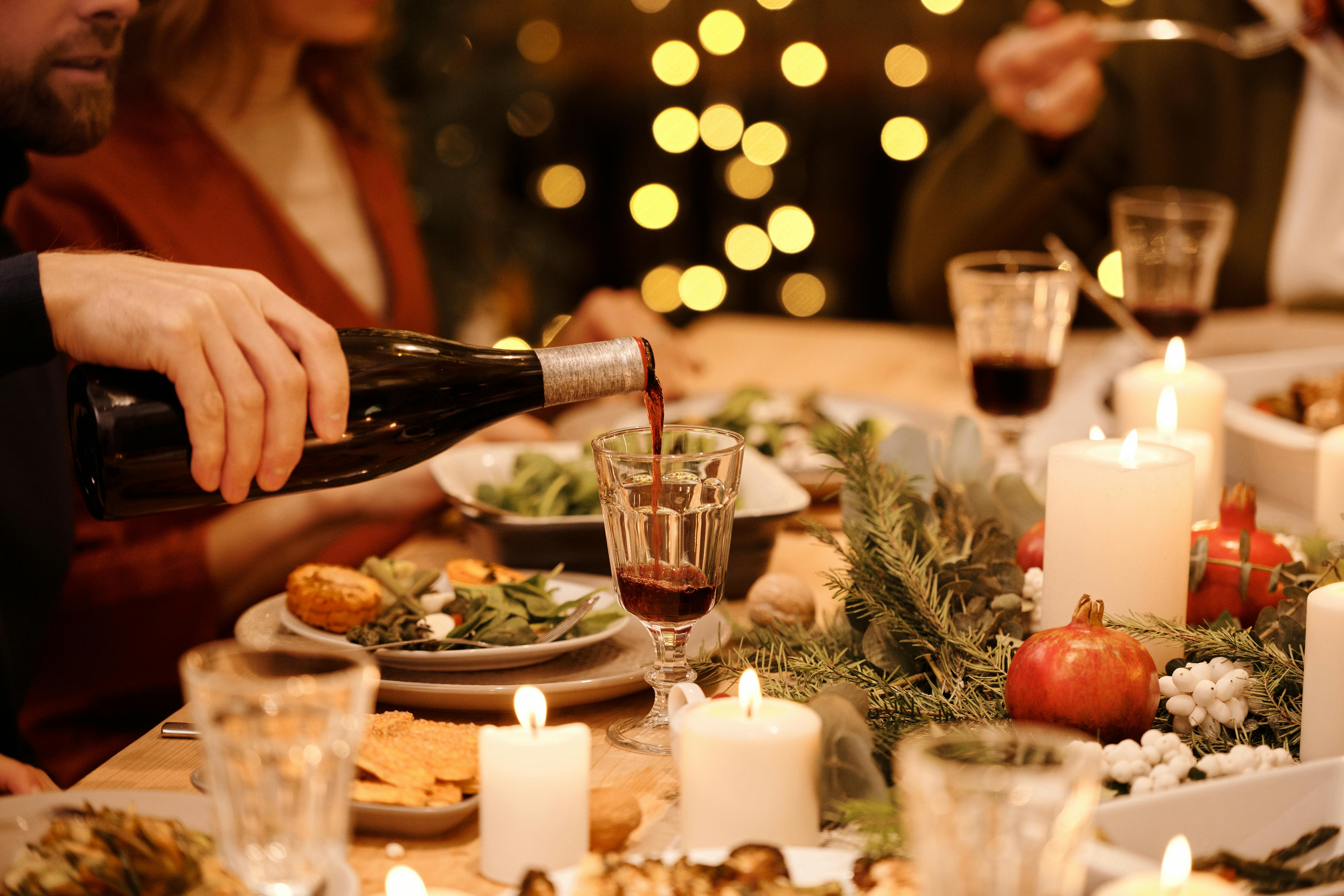 Person pouring wine on glass | Source: Pexels