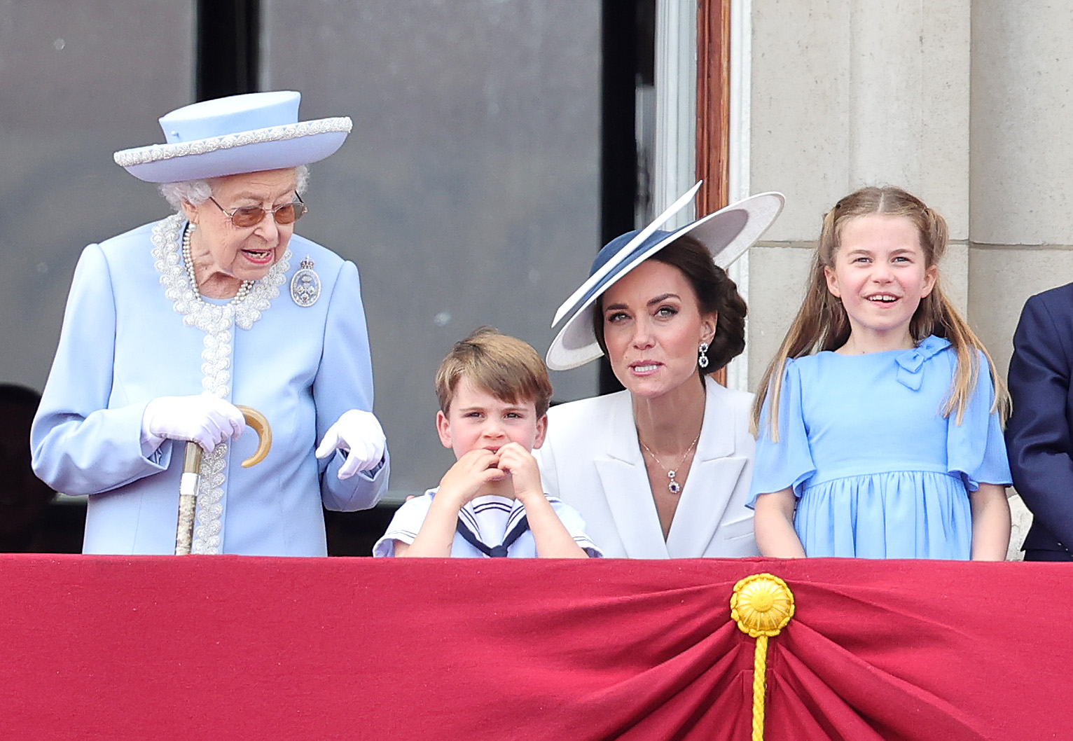 Queen Elizabeth II, Prince Louis, Princess Catherine and Princess Charlotte during Trooping The Colour in London, England on June 2, 2022 | Source: Getty Images