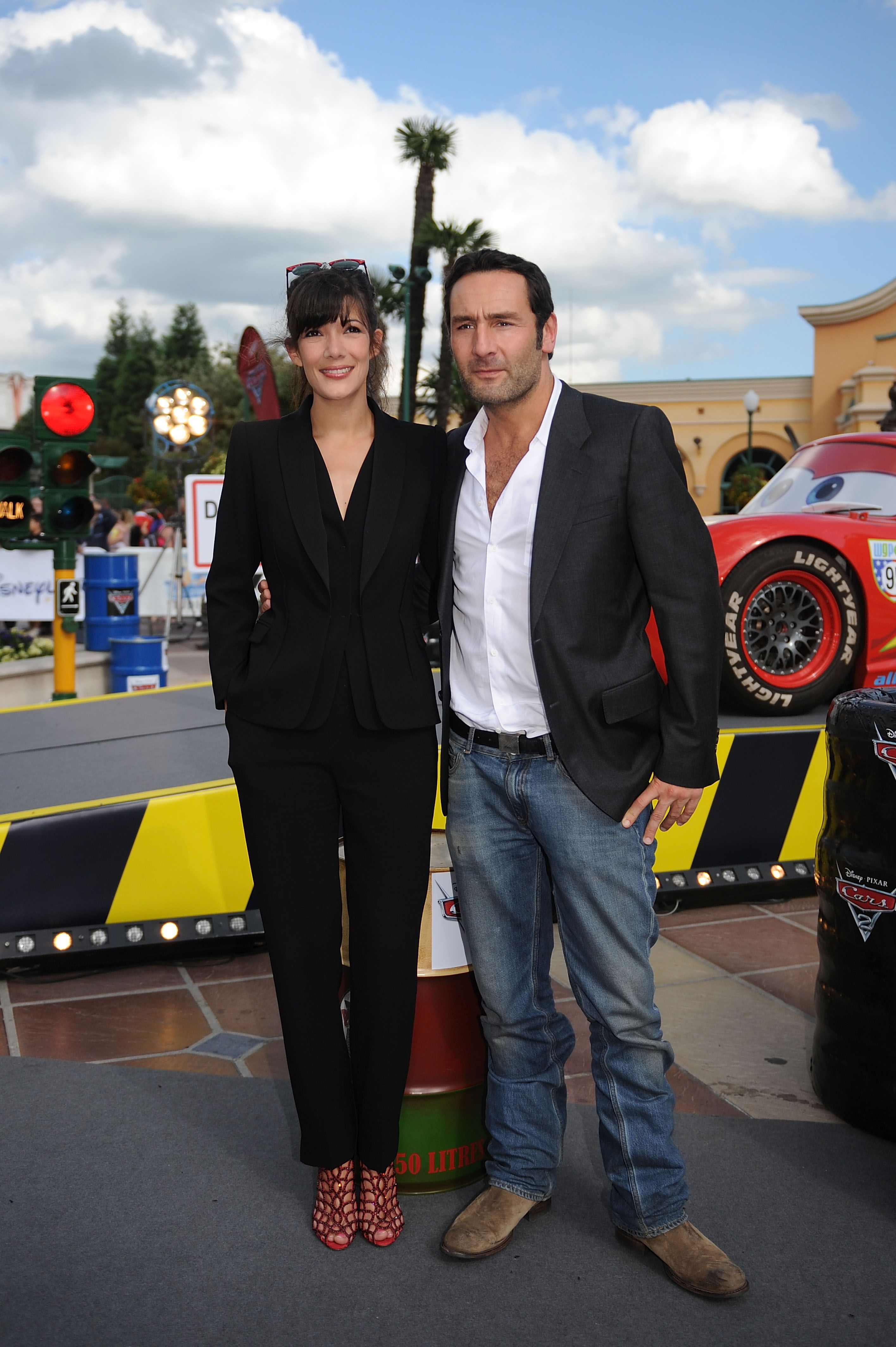 Melanie Doutey et Gilles Lellouche assistent à la première de 'Cars 2' à Disneyland Paris le 25 juin 2011 à Paris, France. | Photo : Getty Images