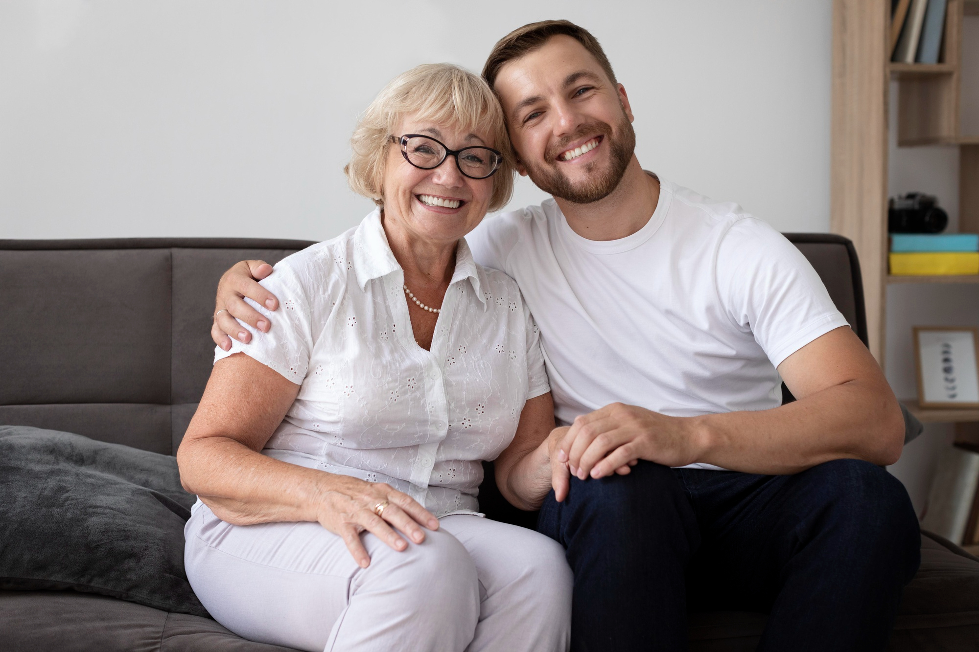 An older woman and a young man bonding | Source: Freepik