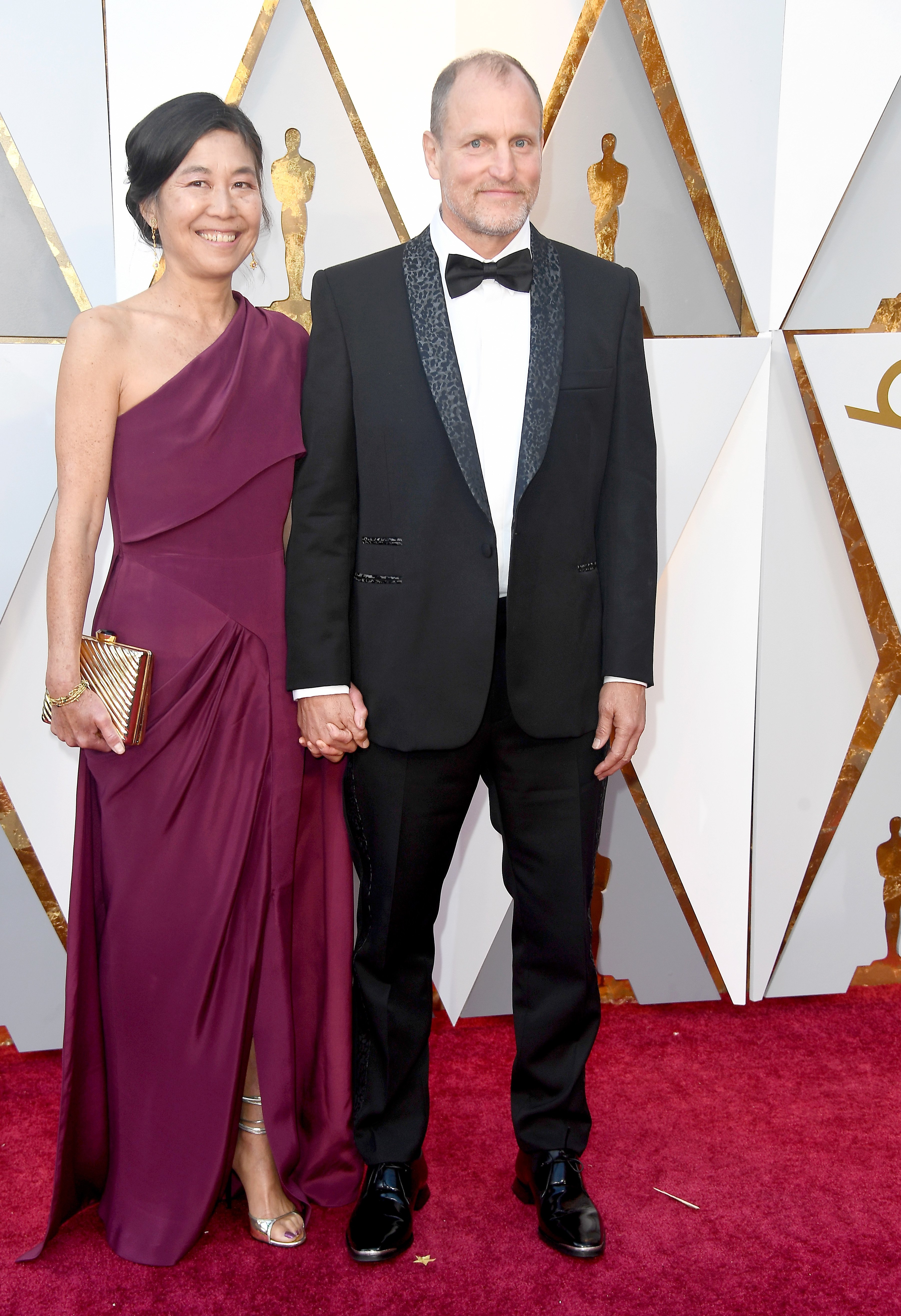 Laura Louie (L) and Woody Harrelson attend the 90th Annual Academy Awards at Hollywood & Highland Center on March 4, 2018, in Hollywood, California. | Source: Getty Images.