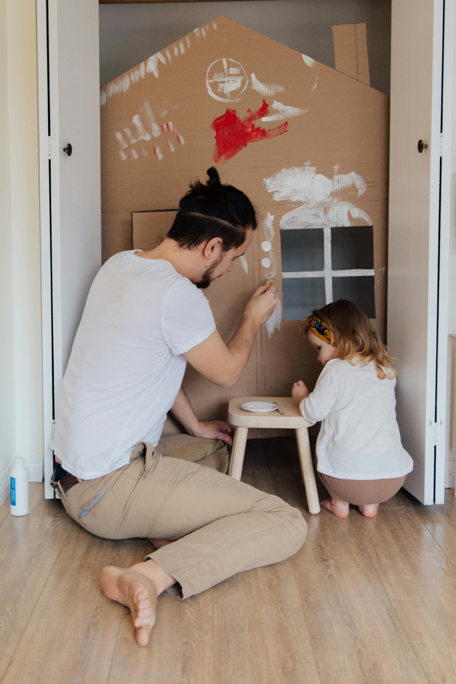 A father and daughter playing together | Source: Pexels
