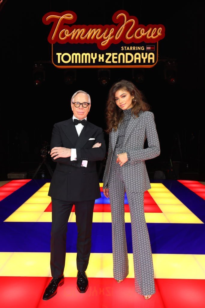 Designer Tommy Hilfiger and Zendaya pose on the runway during the Tommy Hilfiger TOMMYNOW Spring 2019 : TommyXZendaya Premieres at Theatre des Champs-Elysees. | Photo: Getty Images